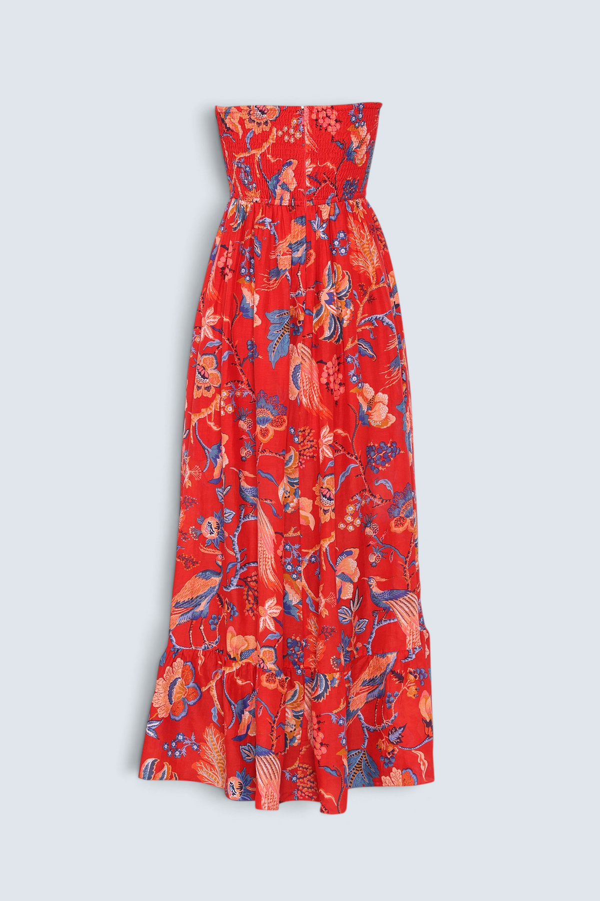 Banjanan Bella dress in red Chintz print cotton silk with a smocked bodice and cascading ruffled skirt.