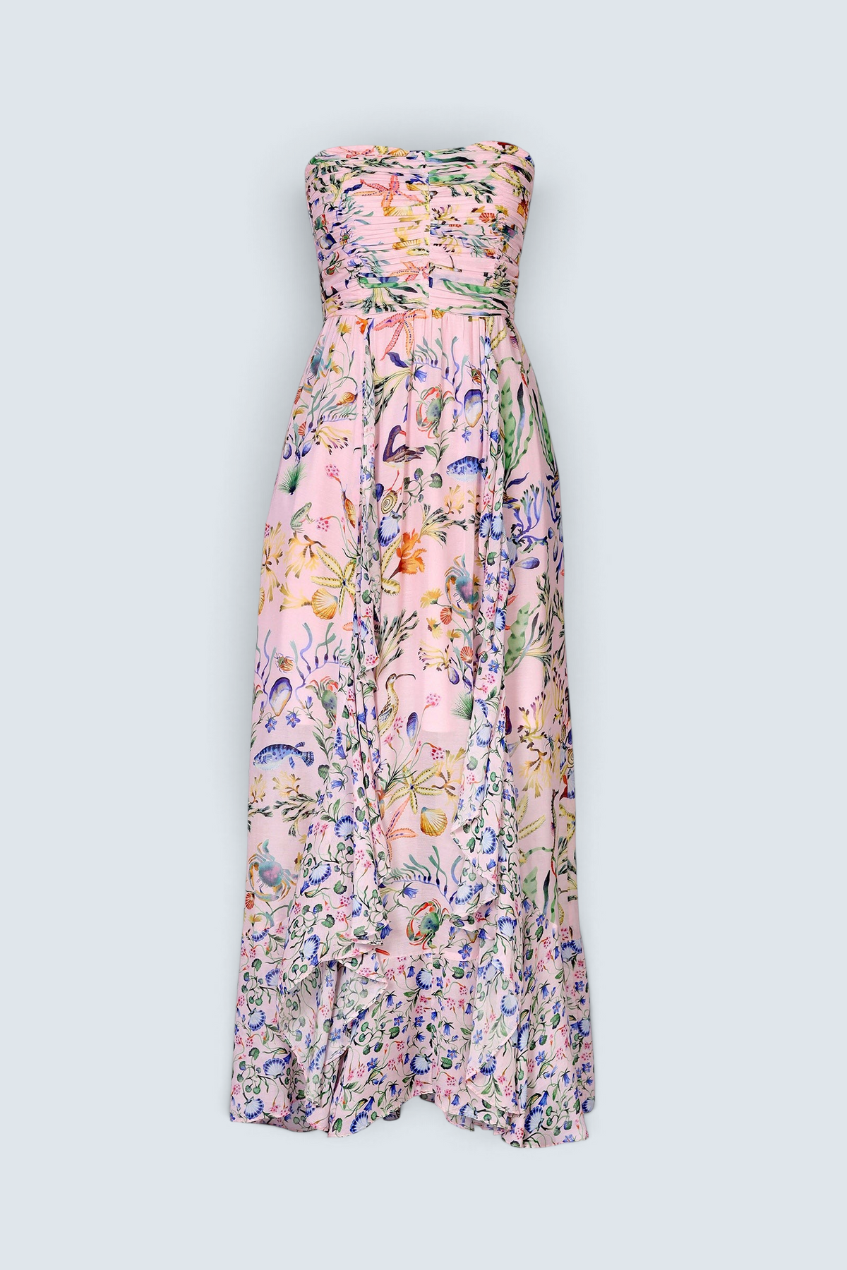 Banjanan Bella full-length strapless dress in pink Tidepool print with ruched bodice and cascading ruffled skirt.