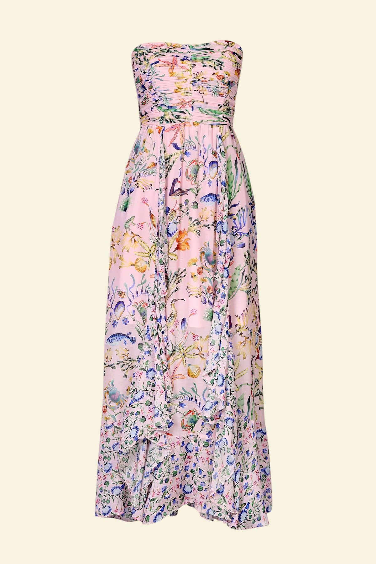 Banjanan Bella full-length strapless dress in pink Tidepool print with ruched bodice and cascading ruffled skirt.