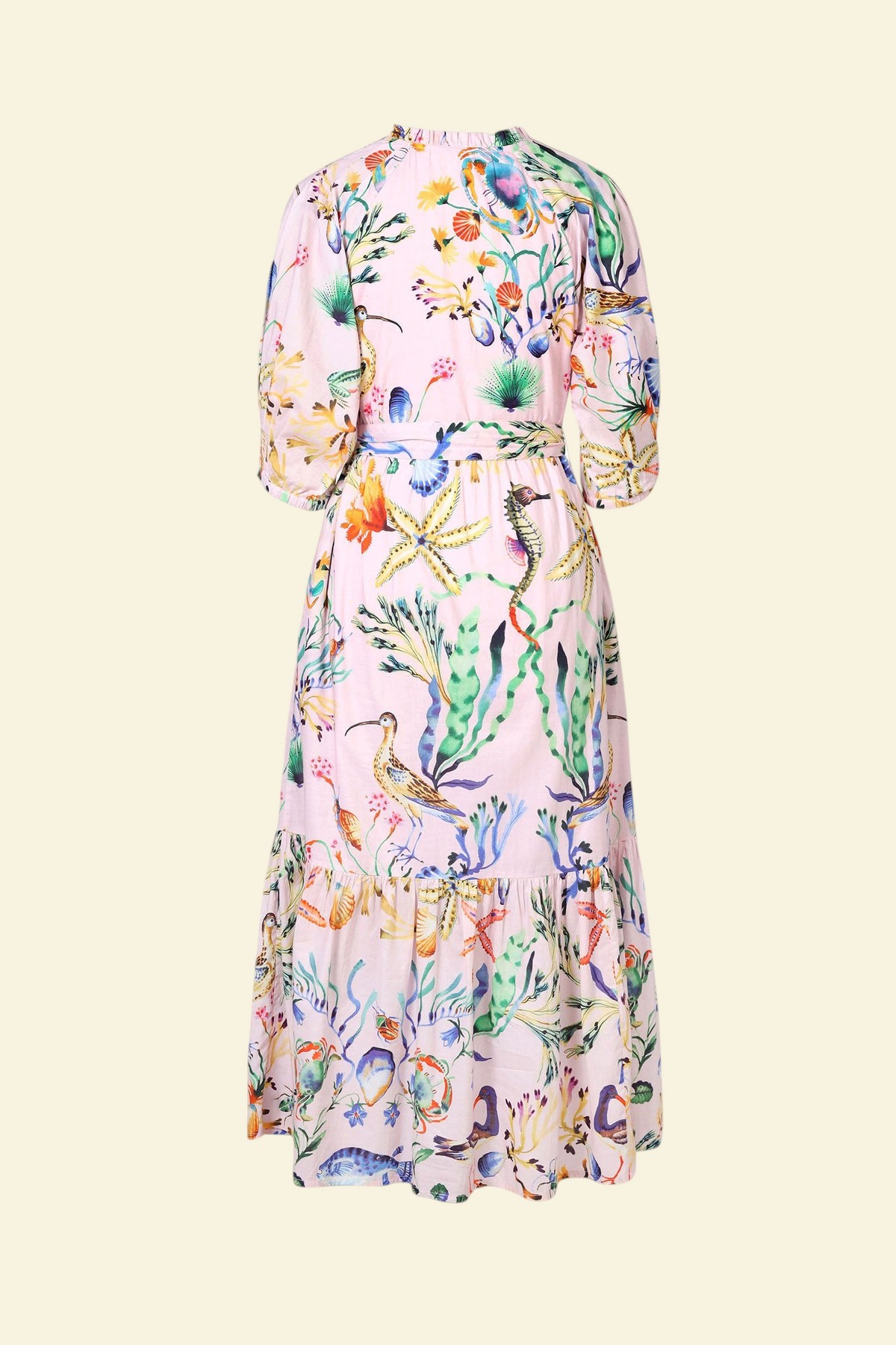Banjanan Betty dress in pink cotton voile with Tidepool sea life print, featuring raglan sleeves and a tie waist.
