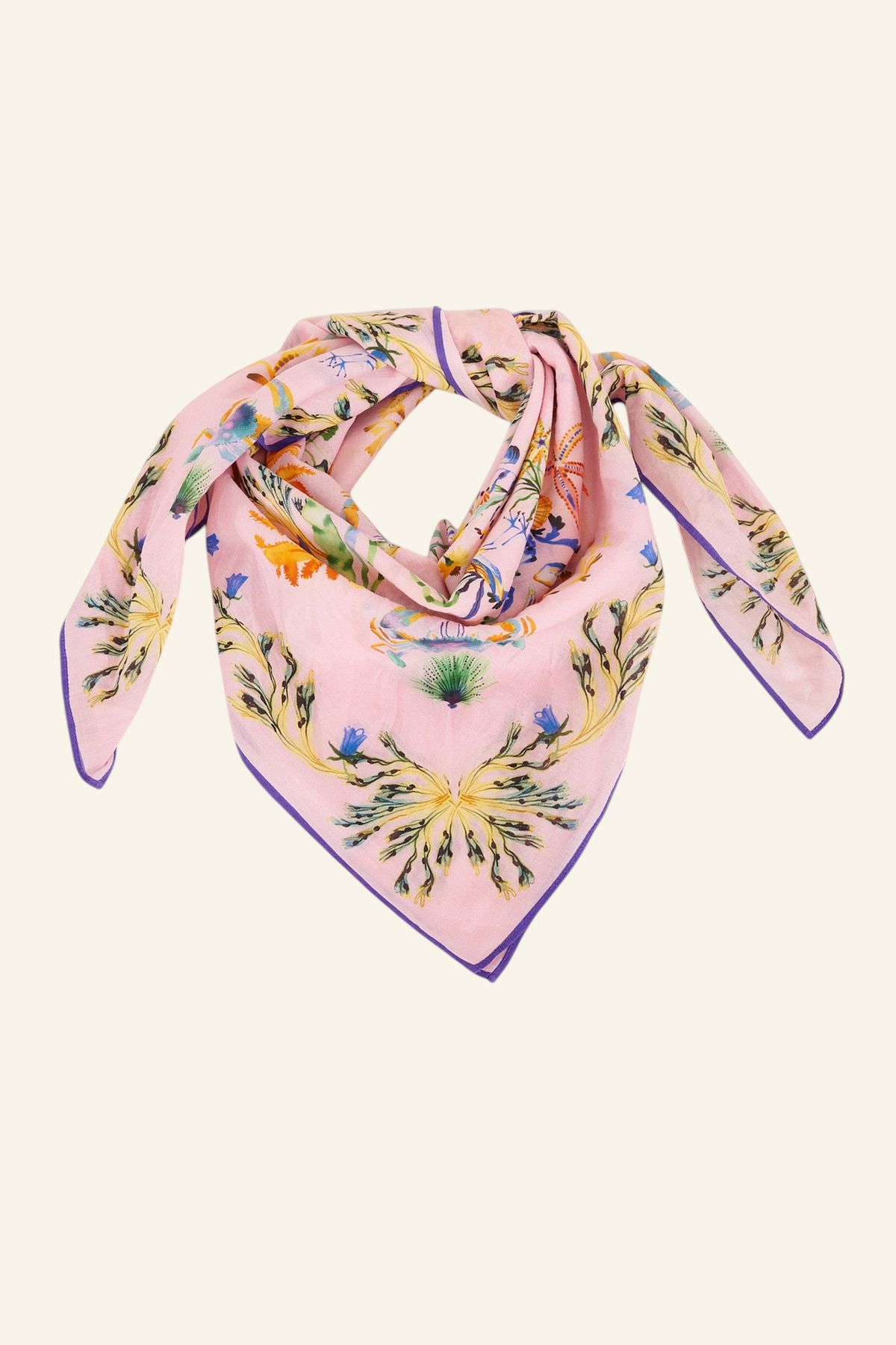 The Carolina scarf in the Tidepool print featuring starfish, seahorse, and shell motifs.