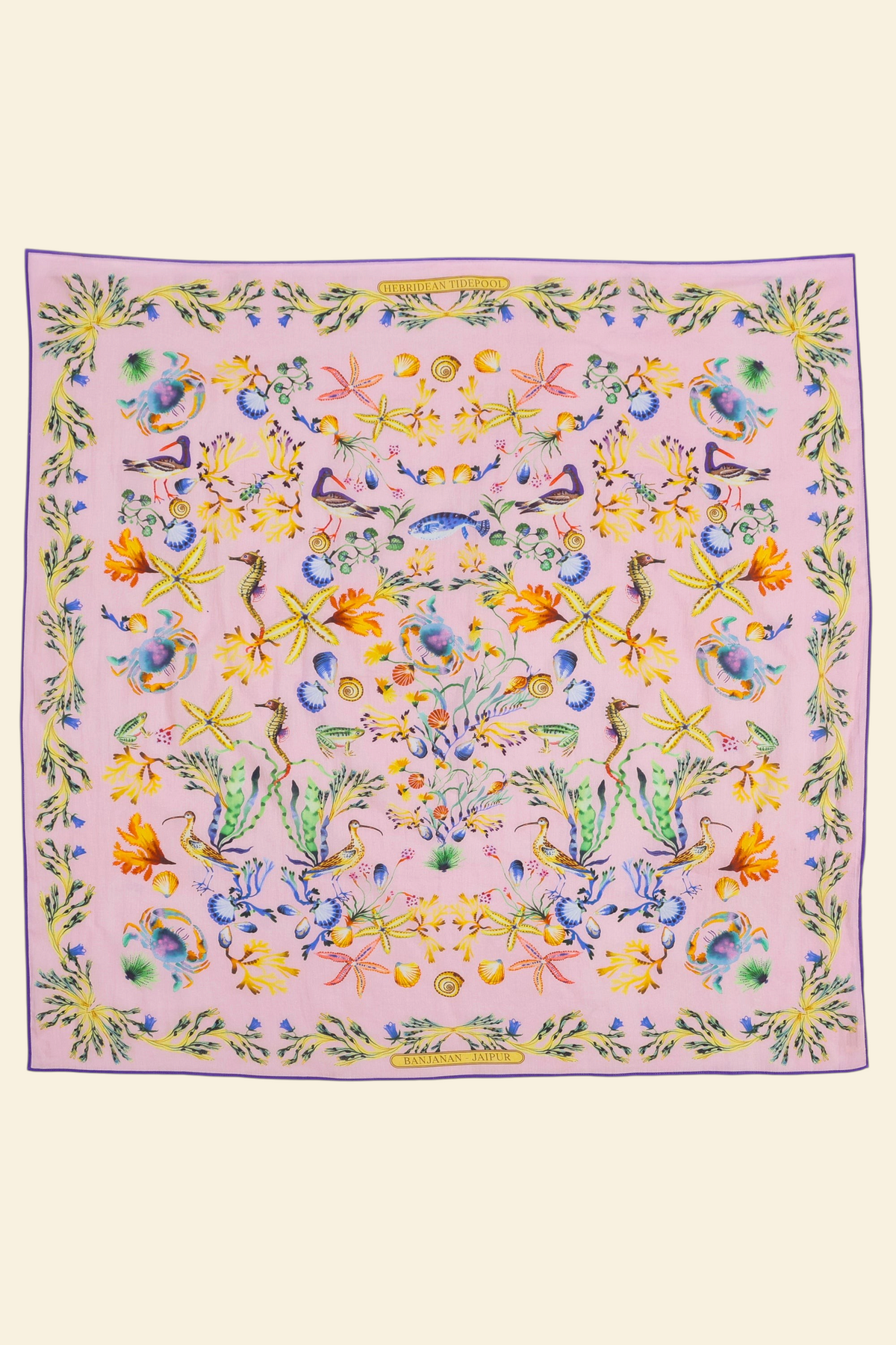 Flat lay of Carolina scarf featuring Tidepool print with starfish, seahorses, and shells in ocean-inspired tones.