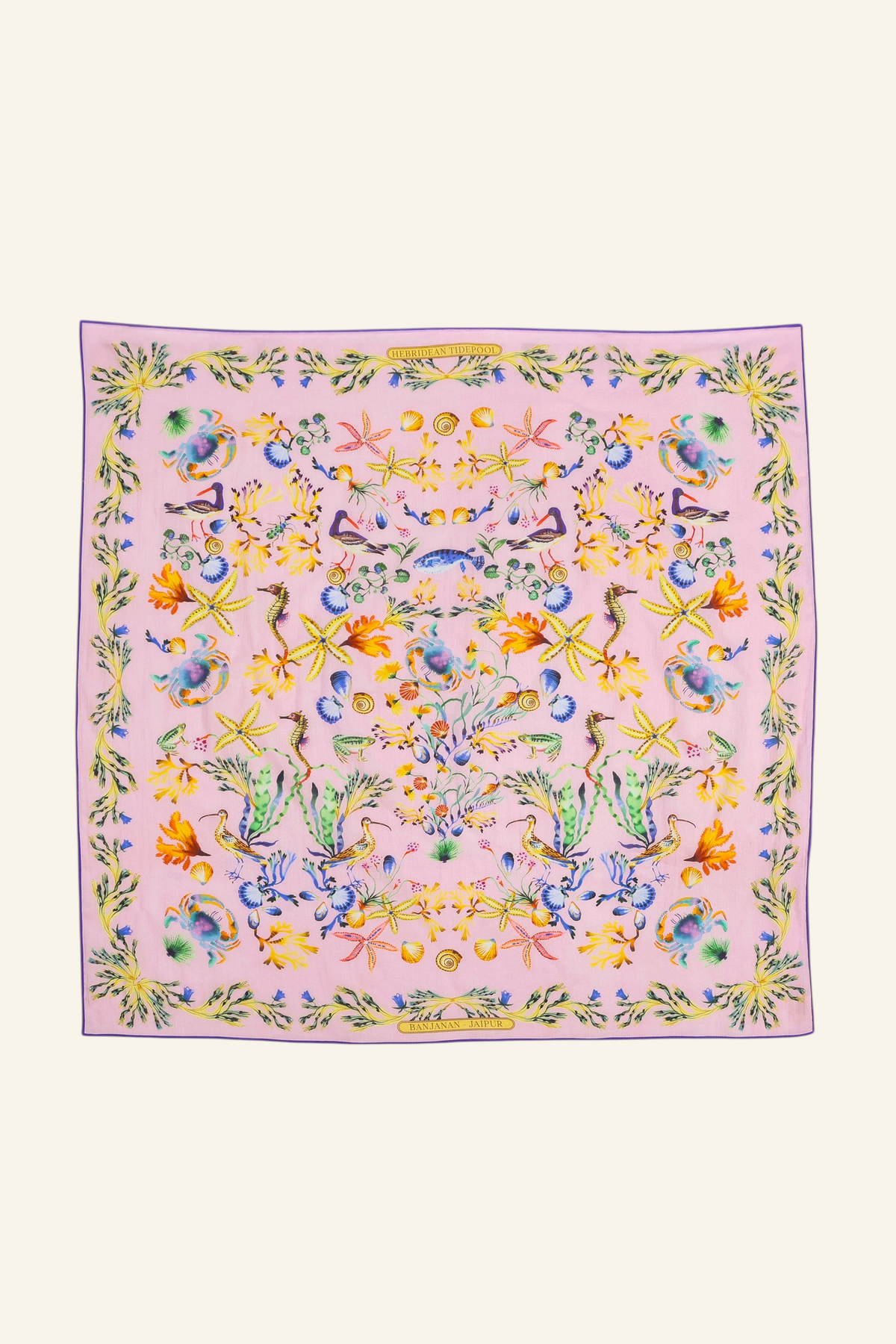 Flat lay of Carolina scarf featuring Tidepool print with starfish, seahorses, and shells in ocean-inspired tones.