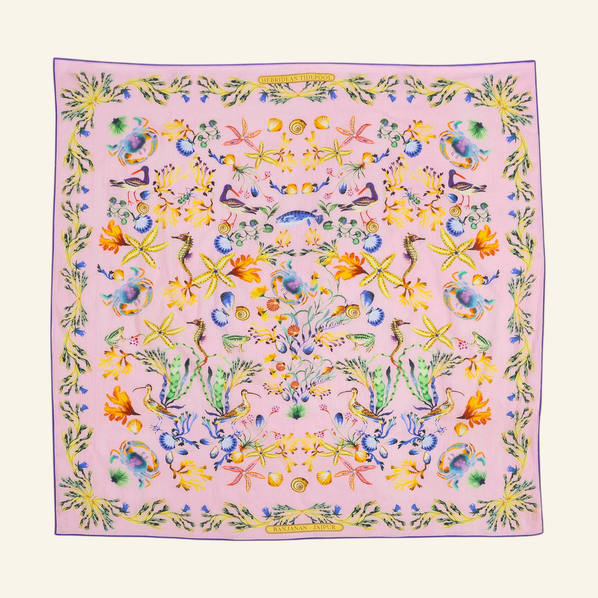 Flat lay of Carolina scarf featuring Tidepool print with starfish, seahorses, and shells in ocean-inspired tones.