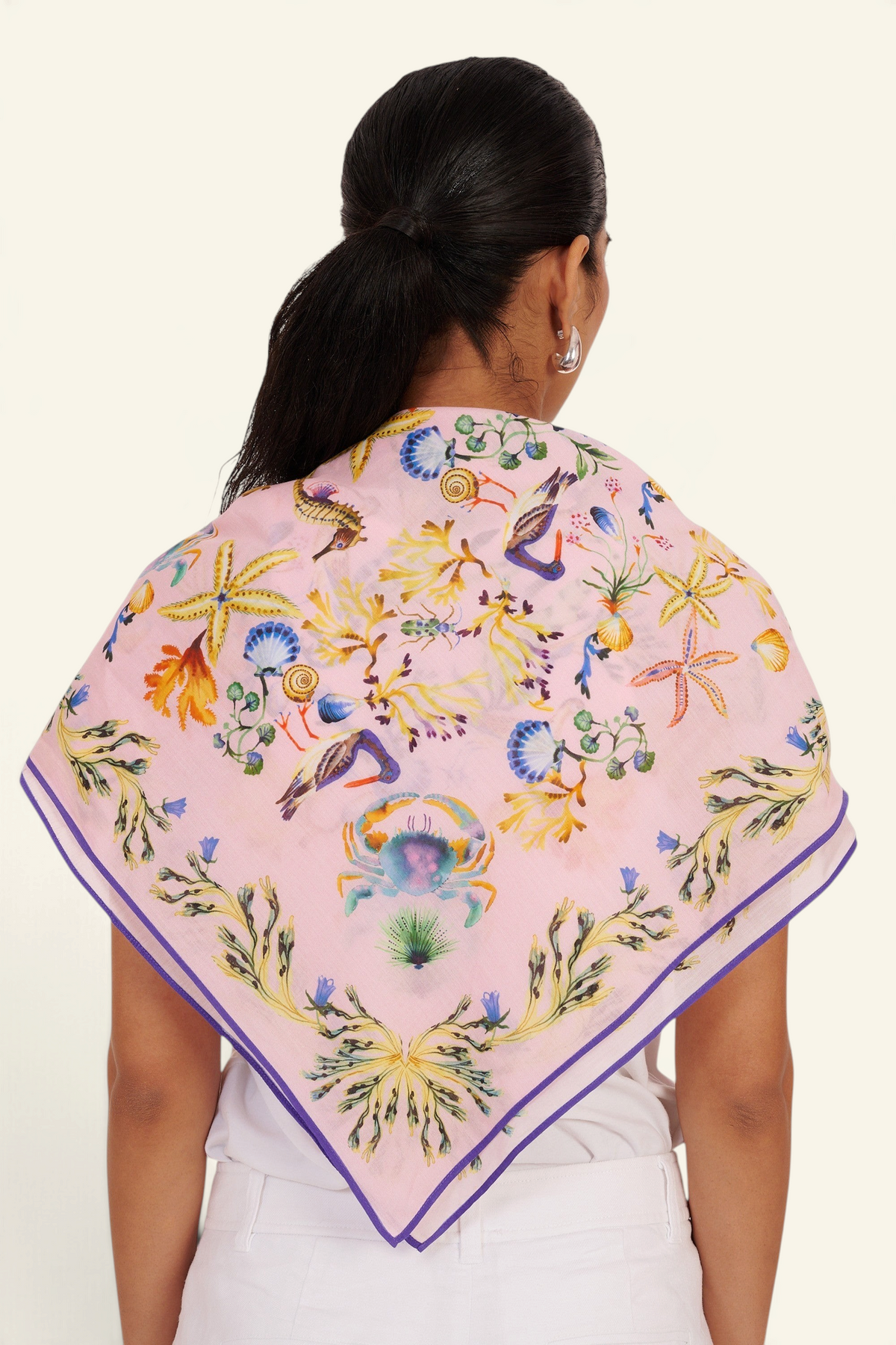 Banjanan Carolina Scarf in pink cotton voile featuring a Tidepool print with starfish, crabs, and sea shells.