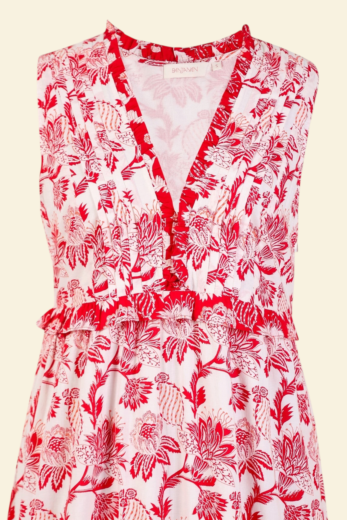 Banjanan Constance dress in Lizzie Poppy Scarlet floral print cotton voile with pleated neckline and frill details.