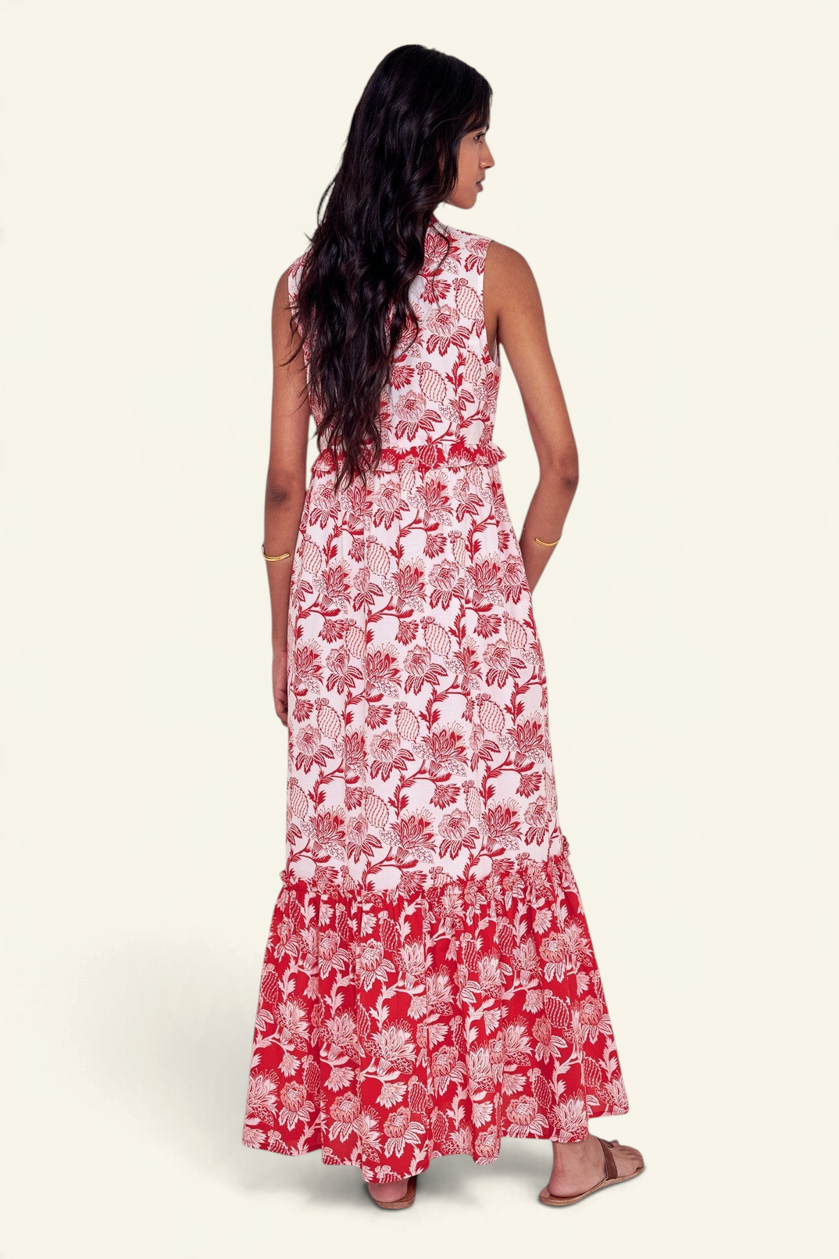 Banjanan Constance dress in Lizzie Poppy Scarlet floral print cotton voile with a pleated bodice and tiered skirt.