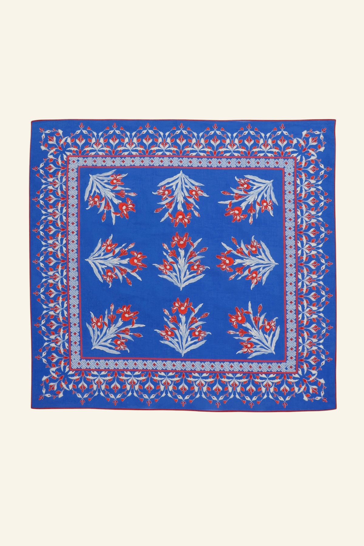 Flat lay of Frances scarf in featuring hand block printed Brigitte print with iris flowers.