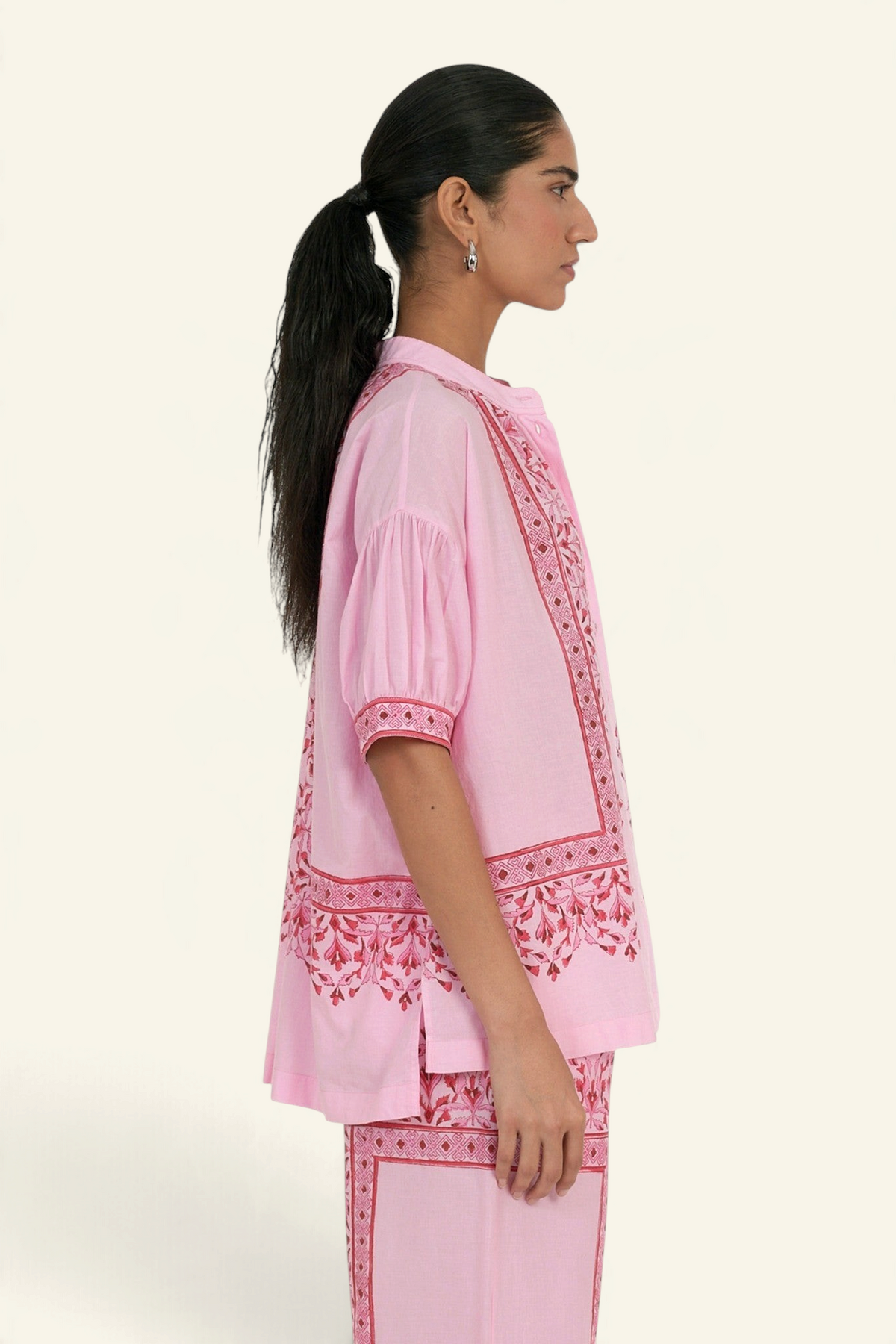 Banjanan Ivy shirt in light pink cotton cambric with Brigitte geometric floral block print and gathered sleeves.