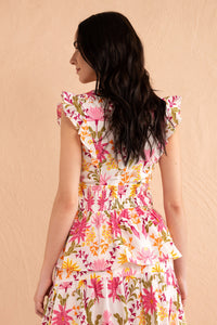Back view of close up of model wearing Kira Top in Hydra Garland print . Back view of close up of model wearing Kira Top in Hydra Garland print .