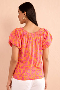 Back view close up of model wearing Louise Top in Gaia Nectarine print. Back view close up of model wearing Louise Top in Gaia Nectarine print.
