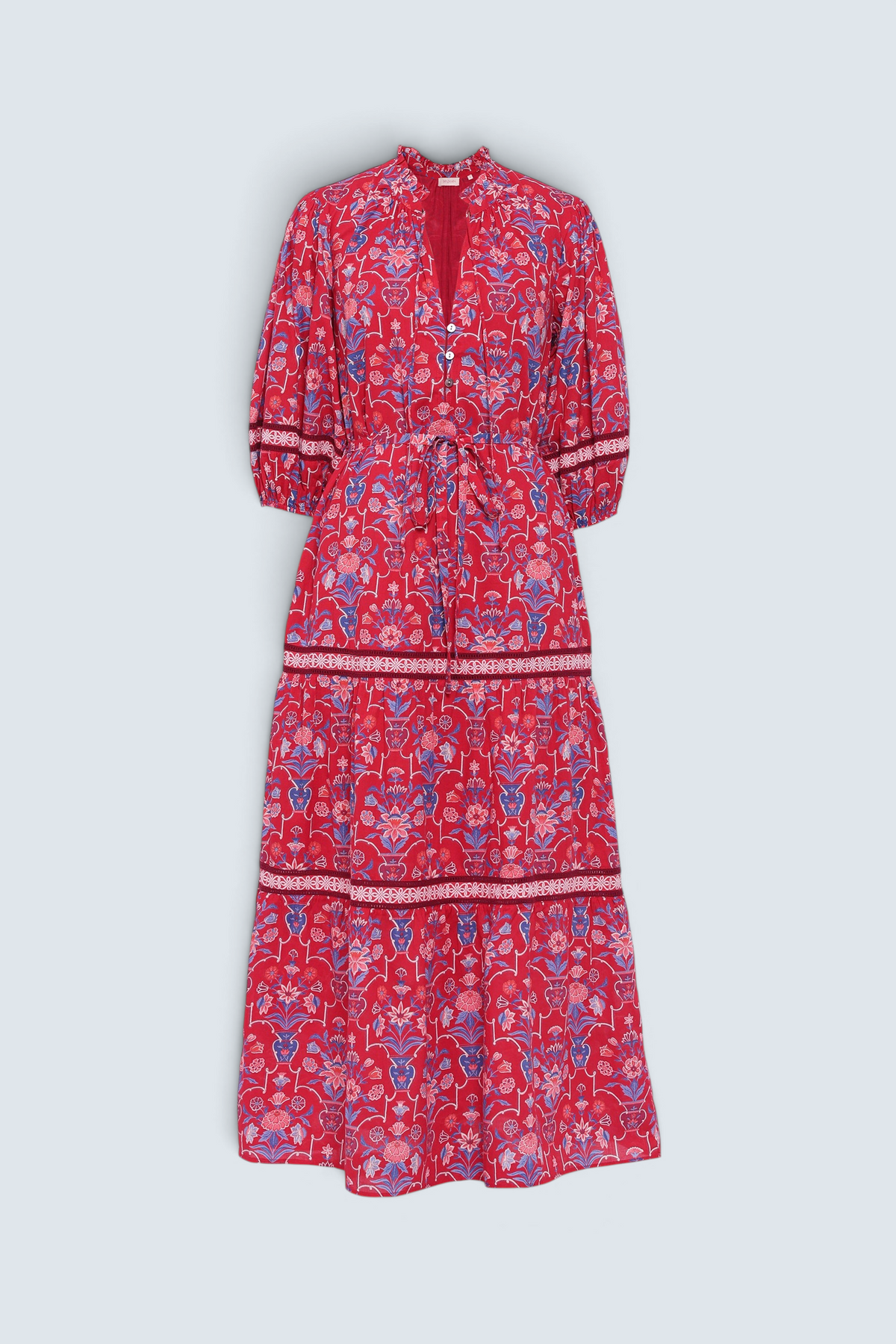 Front view of the Liza dress in Floral Vase print. It features a tie neckline, soft ruffles, lace sleeve and skirt details, and a fabric belt.