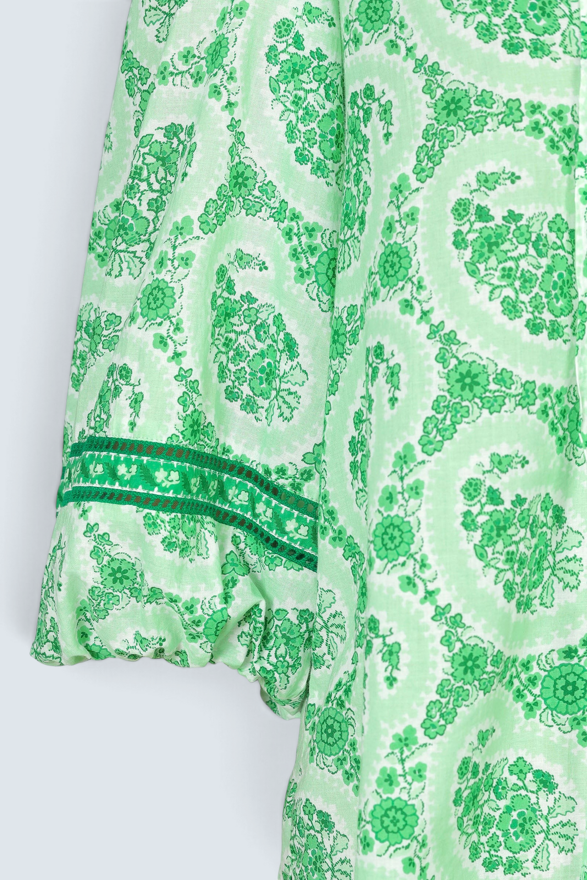 Banjanan Lorna top in green paisley cotton voile with voluminous sleeves and contrast trim detail.