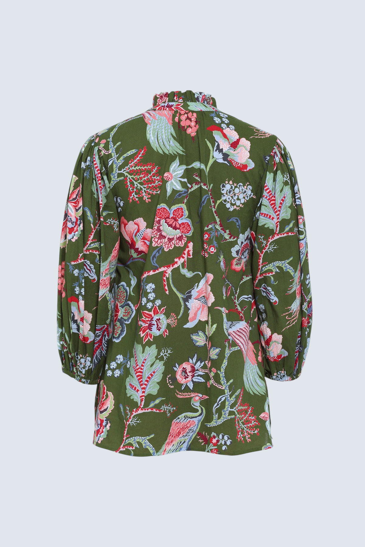 Banjanan Lorna top in moss green cotton voile with a floral chintz bird print, v-neck, and voluminous sleeves.