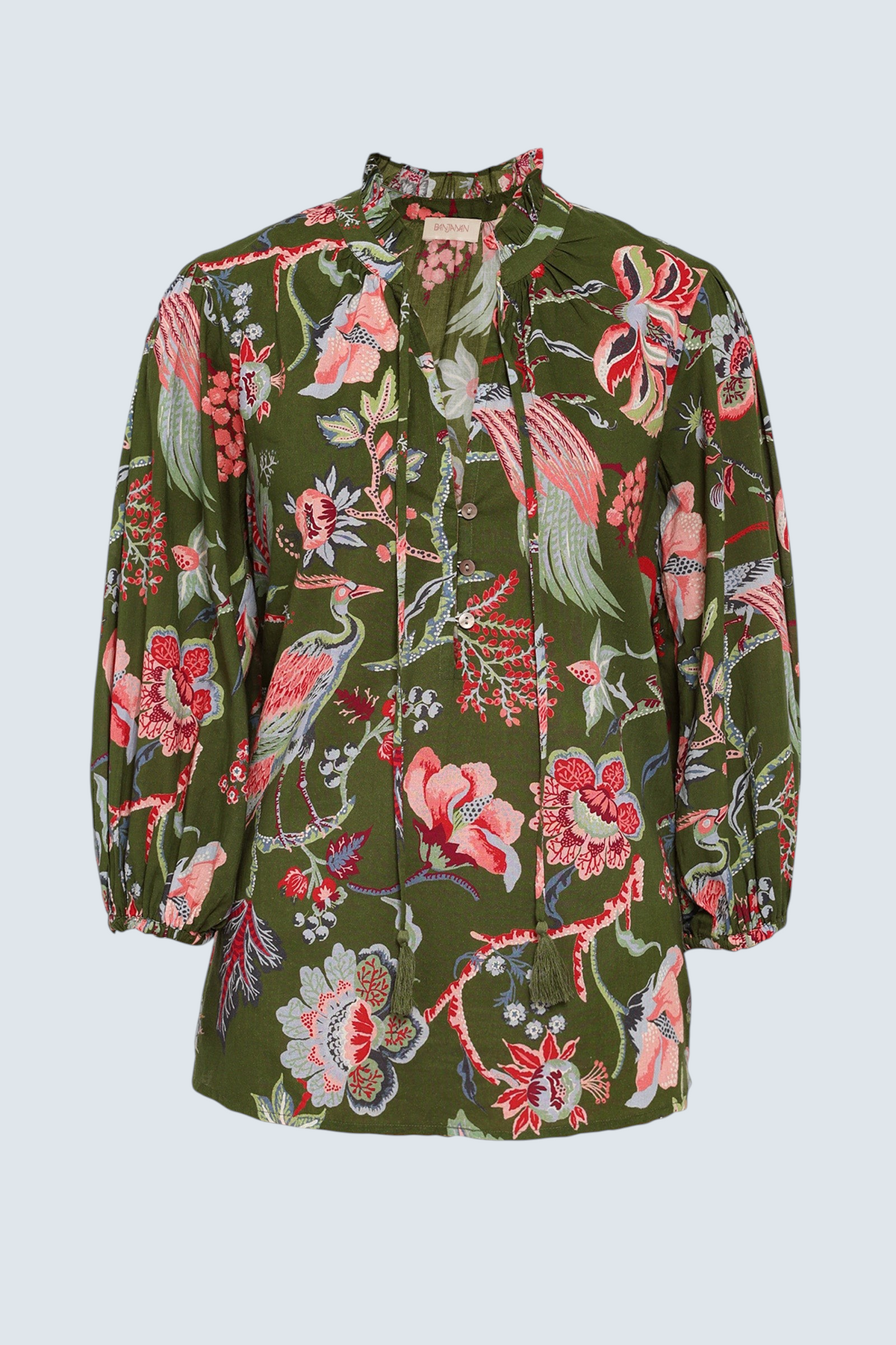 Banjanan Lorna top in moss green cotton voile with a floral and bird chintz print, v-neck, and ruffled collar.