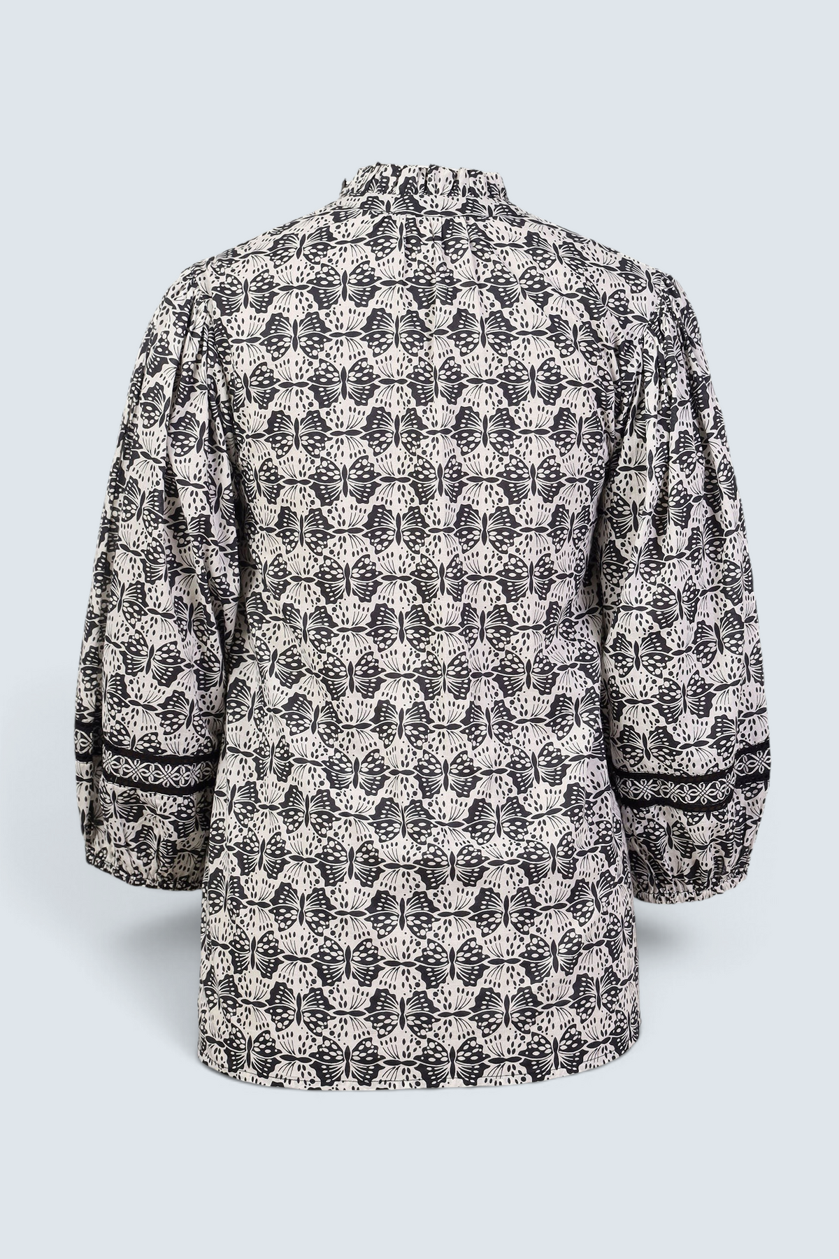 Banjanan Lorna top in black and white butterfly print cotton voile with voluminous sleeves and lace detail back view