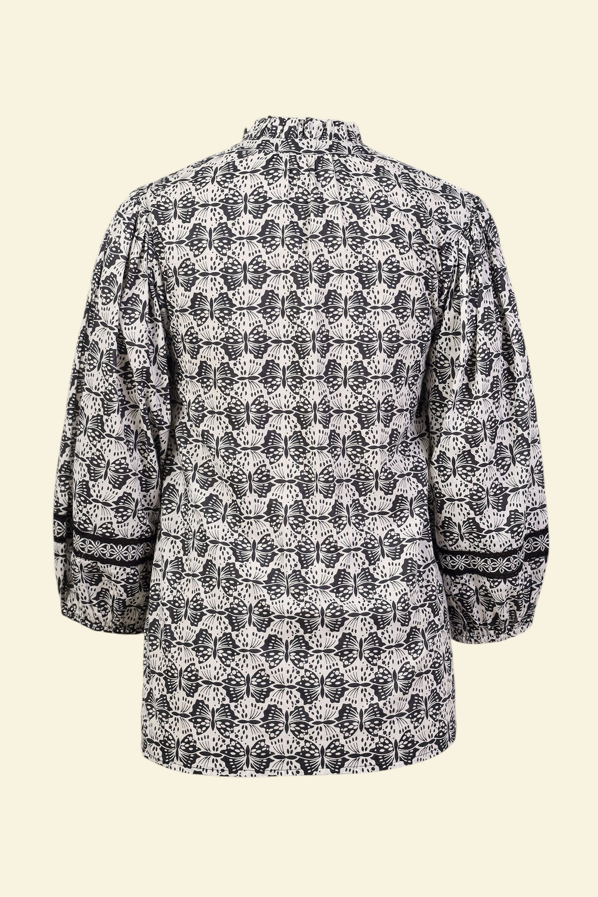 Banjanan Lorna top in black and white butterfly print cotton voile with voluminous sleeves and lace detail back view