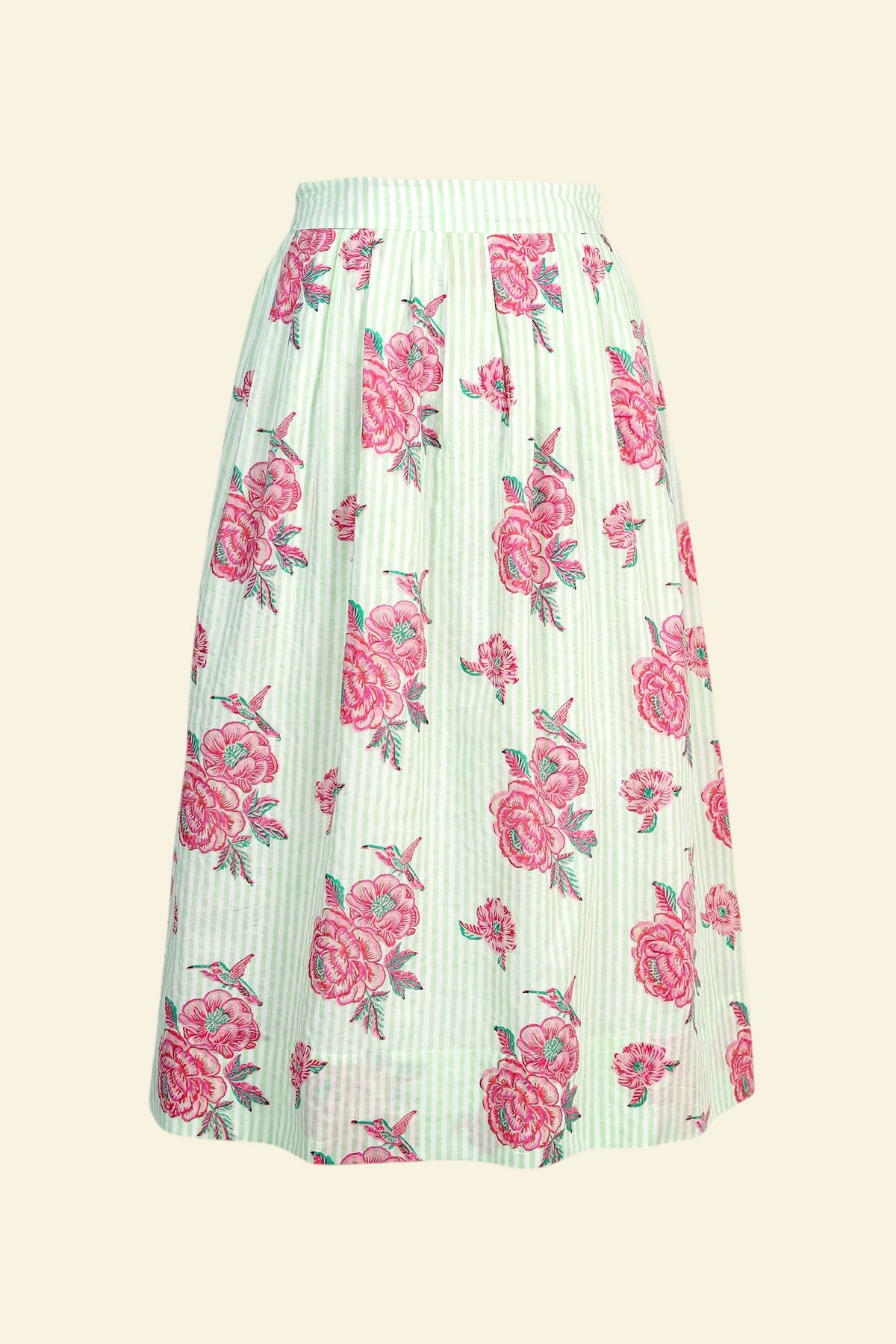 Front view the Magdalena skirt in the Eliza Rose print, featuring all-around pleats & hand block-printed floral motifs.