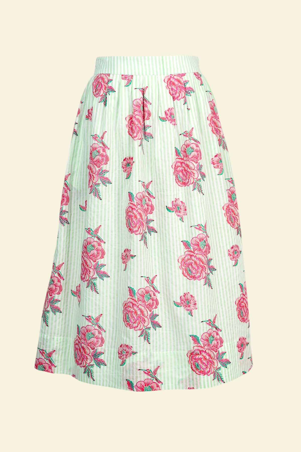 Back view the Magdalena skirt in the Eliza Rose print, featuring all-around pleats & hand block-printed floral motifs.
