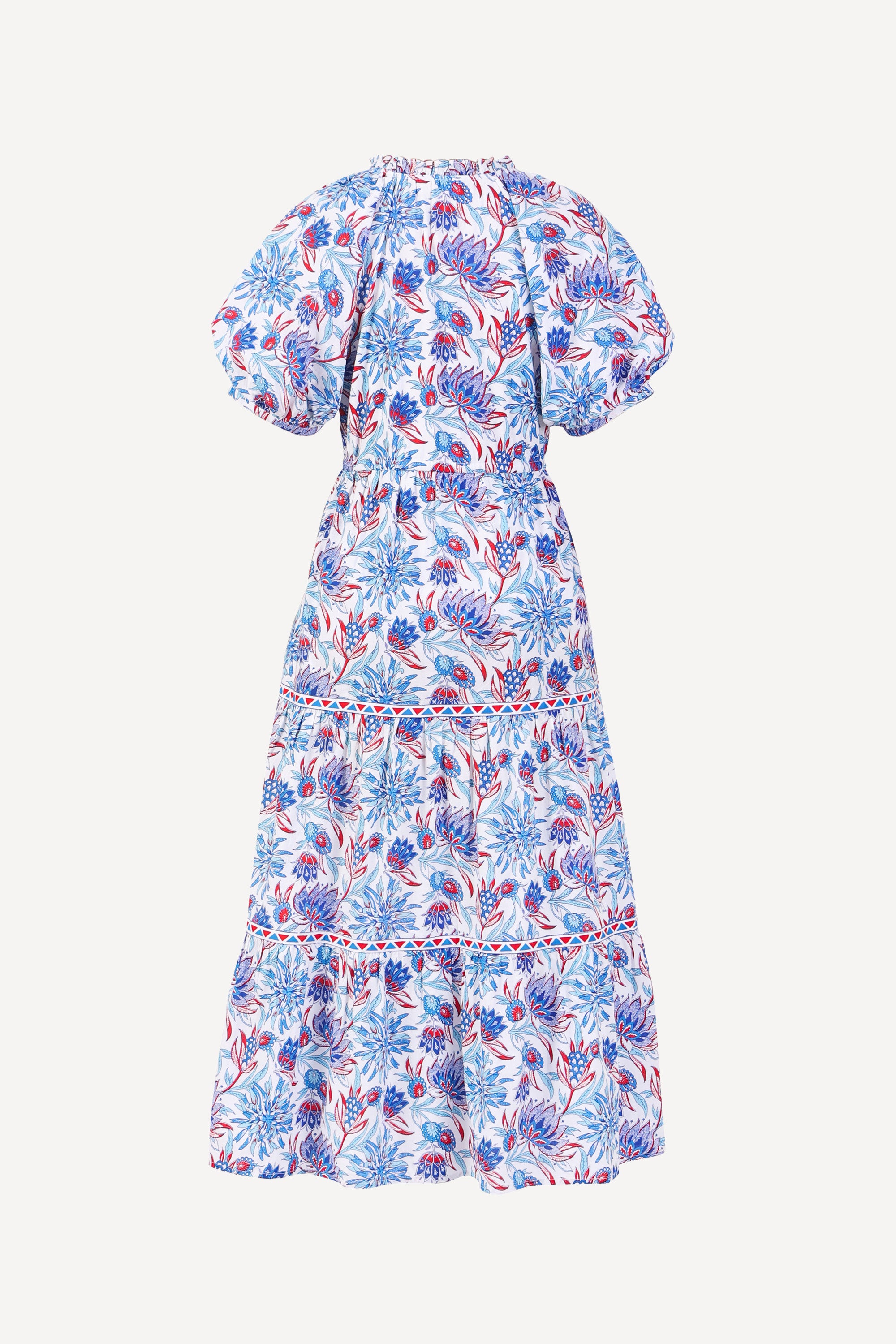 Back view of the Poppy dress in Philippa floral print with raglan blouson sleeves, button front, drawstring waist, and flowing skirt.