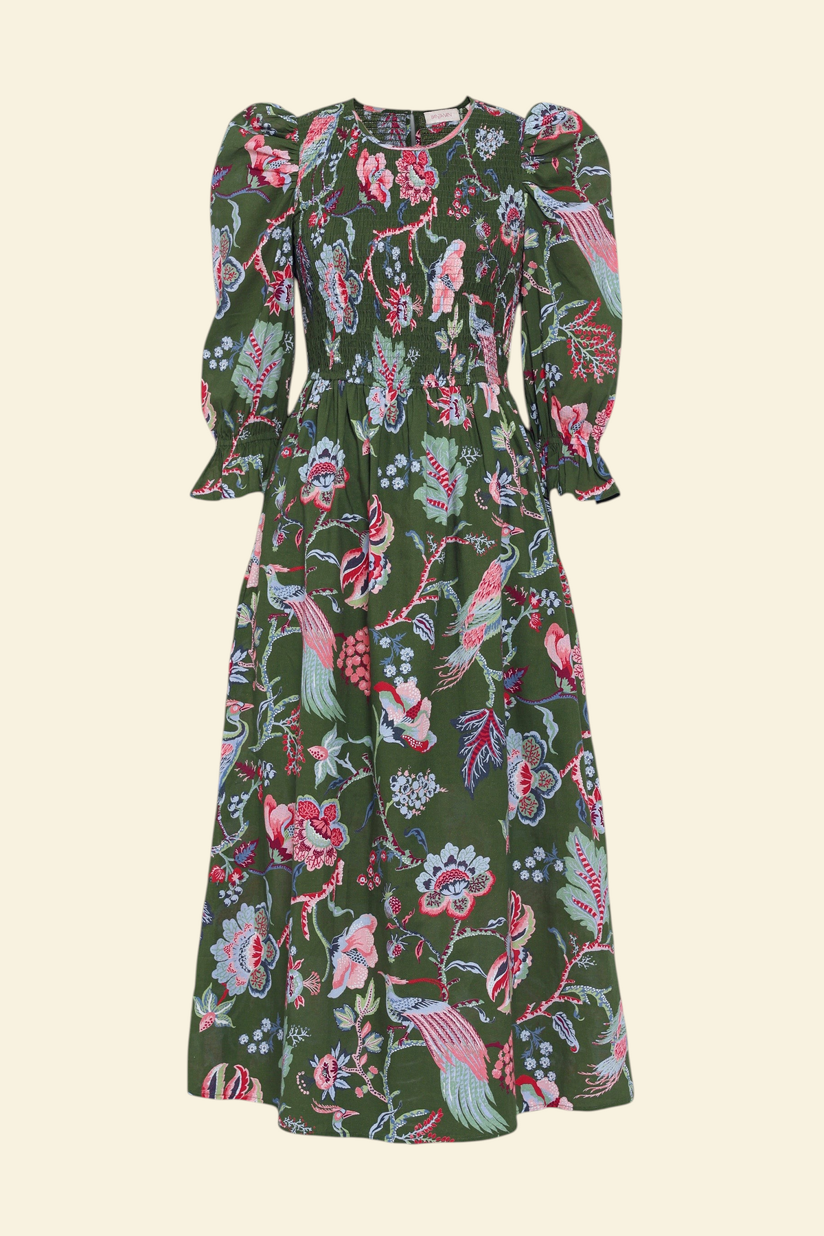 Banjanan Queenie dress in moss green with chintz floral print, smocked bodice, and puff sleeves.