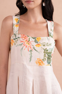 Front view close up of model wearing Ophelia Dress in Desert Rose Dawn print in linen. Front view close up of model wearing Ophelia Dress in Desert Rose Dawn print in linen.