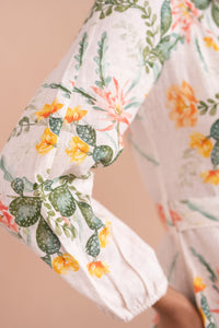 Sleeve close up of Rowena Dress in Desert Rose Dawn print in linen. Sleeve close up of Rowena Dress in Desert Rose Dawn print in linen.