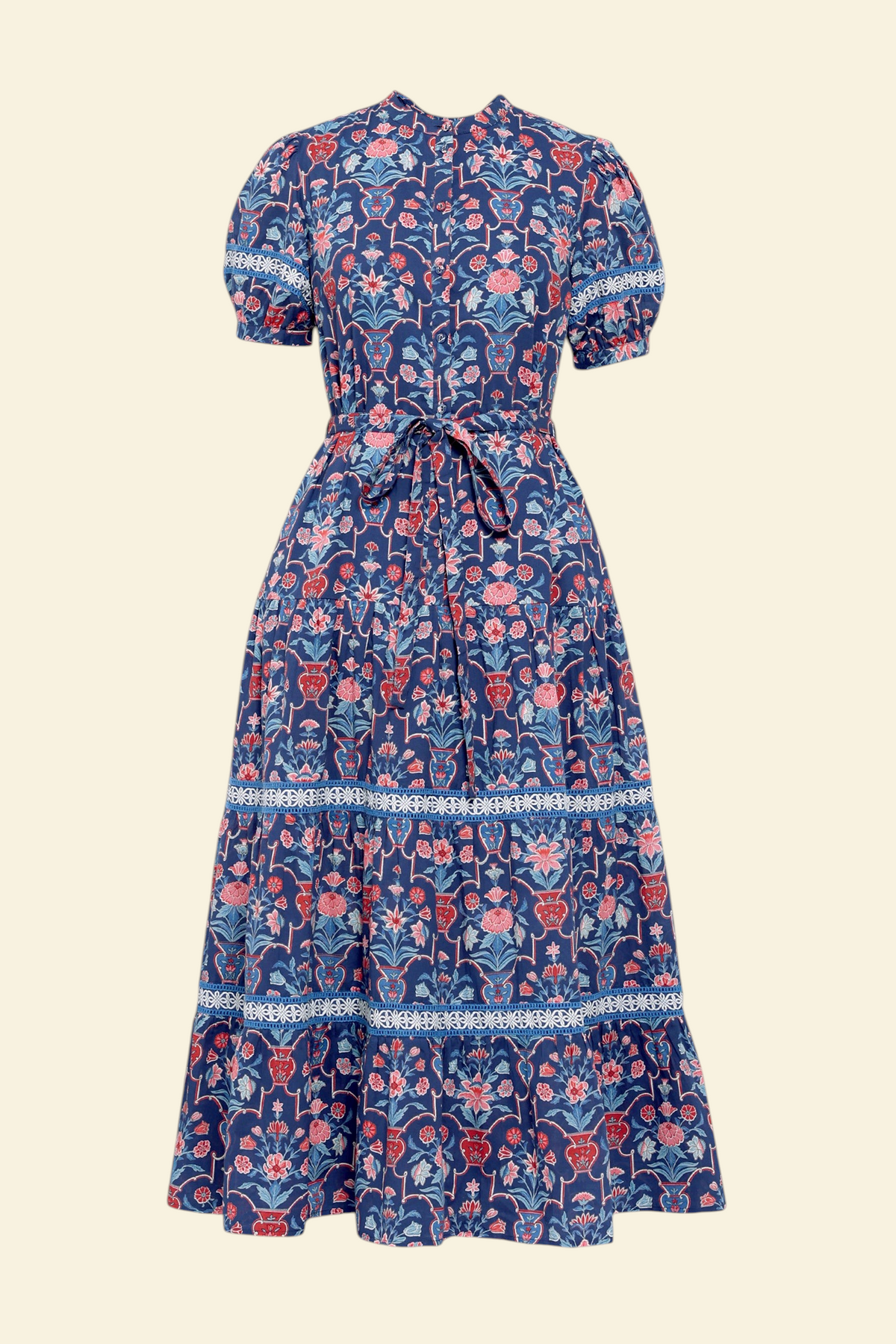 Banjanan Saylor midi shirtdress in medieval blue floral vase print with lace trim, puff sleeves, and waist belt.