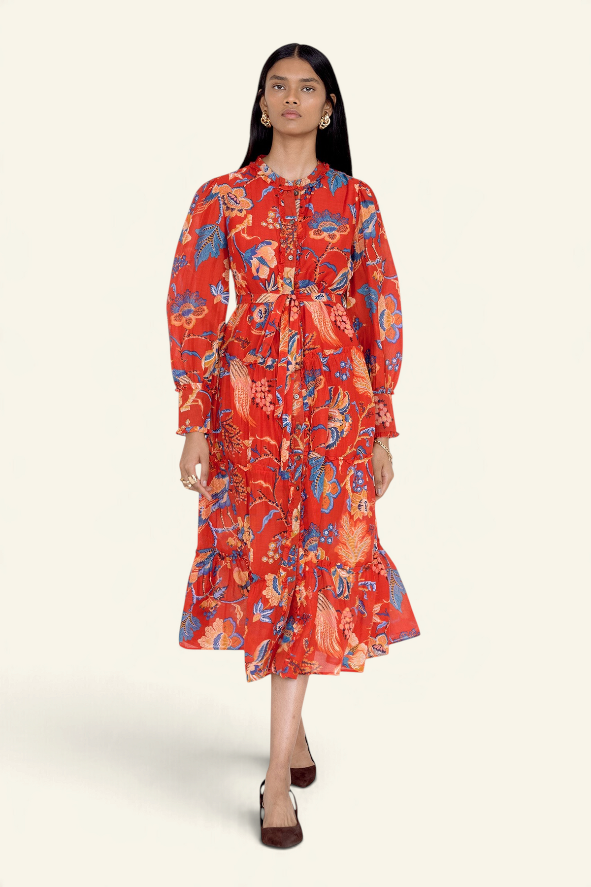 Banjanan Emira dress in carmine red cotton silk with Victorian-inspired chintz floral print, ruffles, and belt.