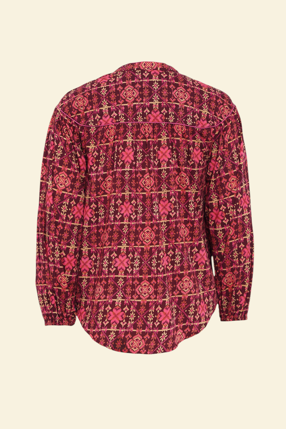 Banjanan Vanessa top in mahogany cotton voile with a geometric floral needlepoint print and quilted shoulder detail.