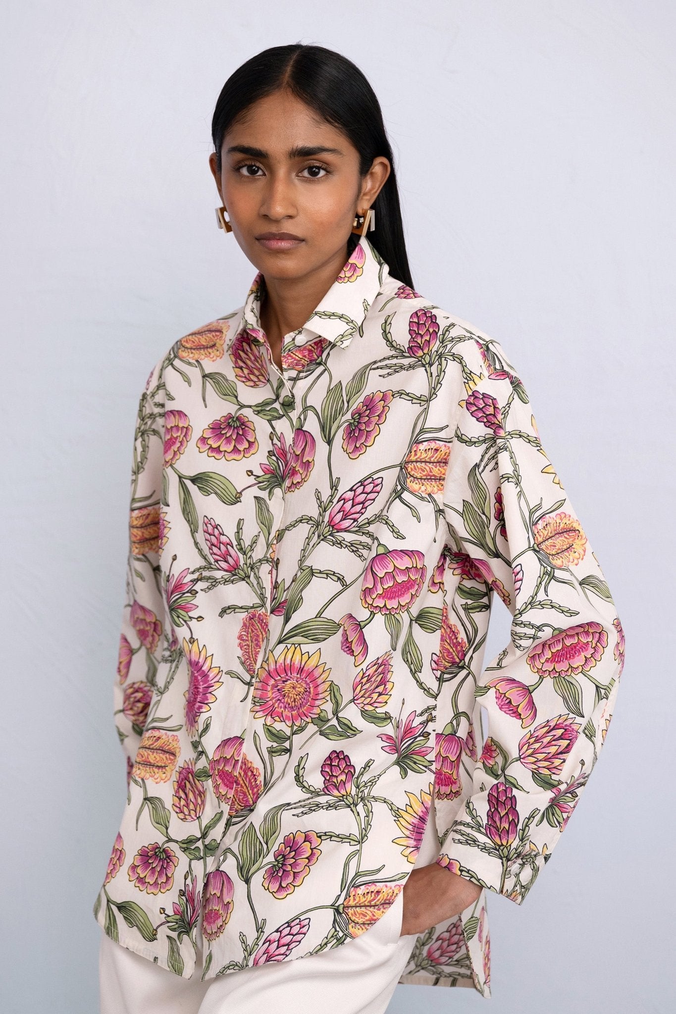 Side view close up of model wearing Charlotte Shirt in Protea Cypress print.