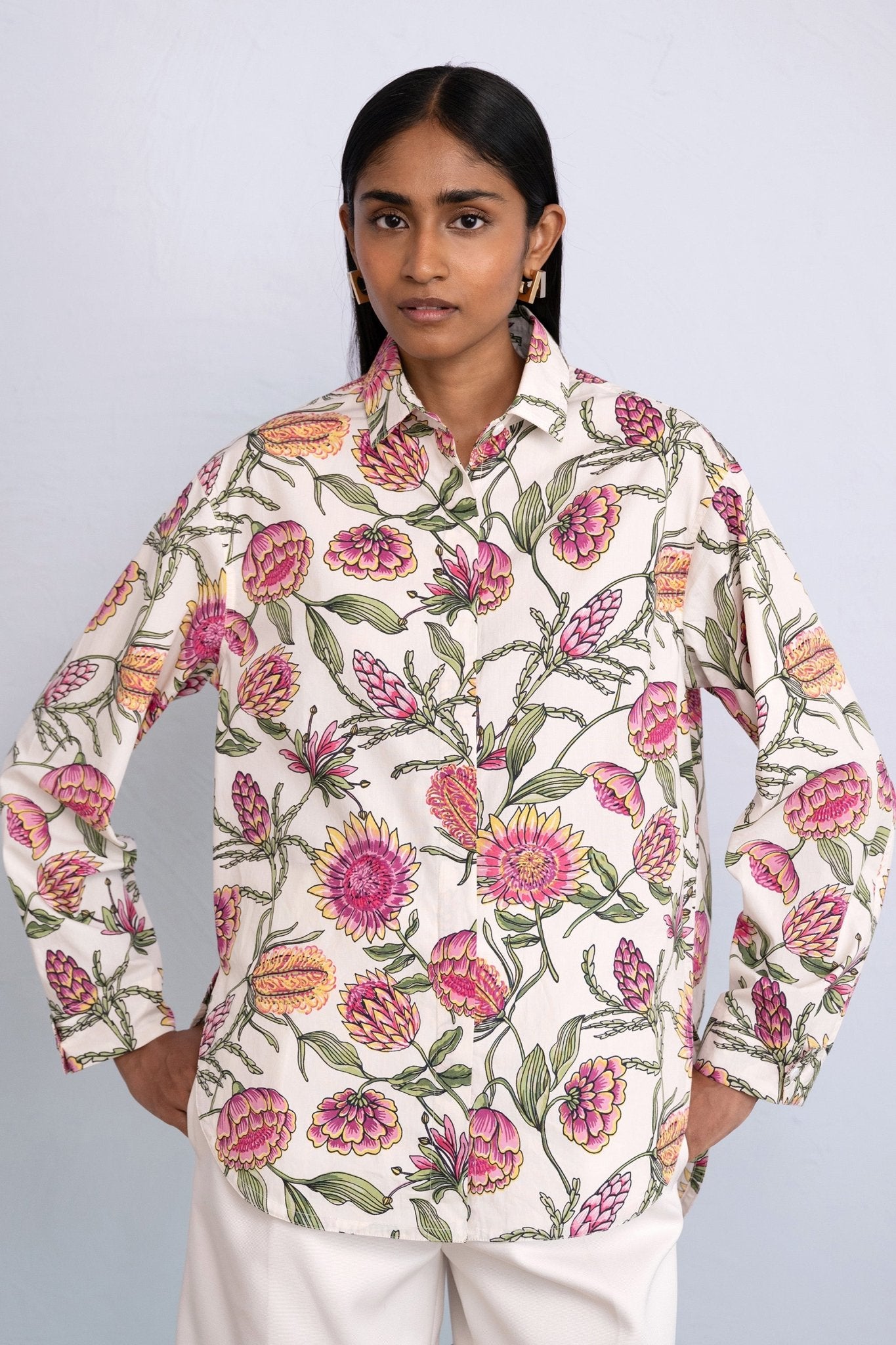 Front view close up of model wearing Charlotte Shirt in Protea Cypress print.
