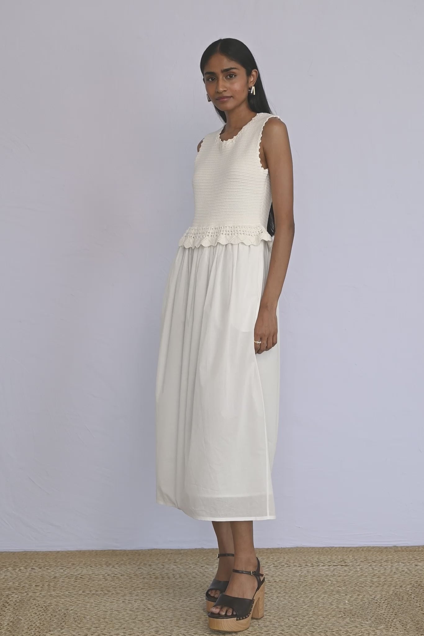 Video of model wearing Heather Crochet Dress in Ivory colour showing all sides of dress.