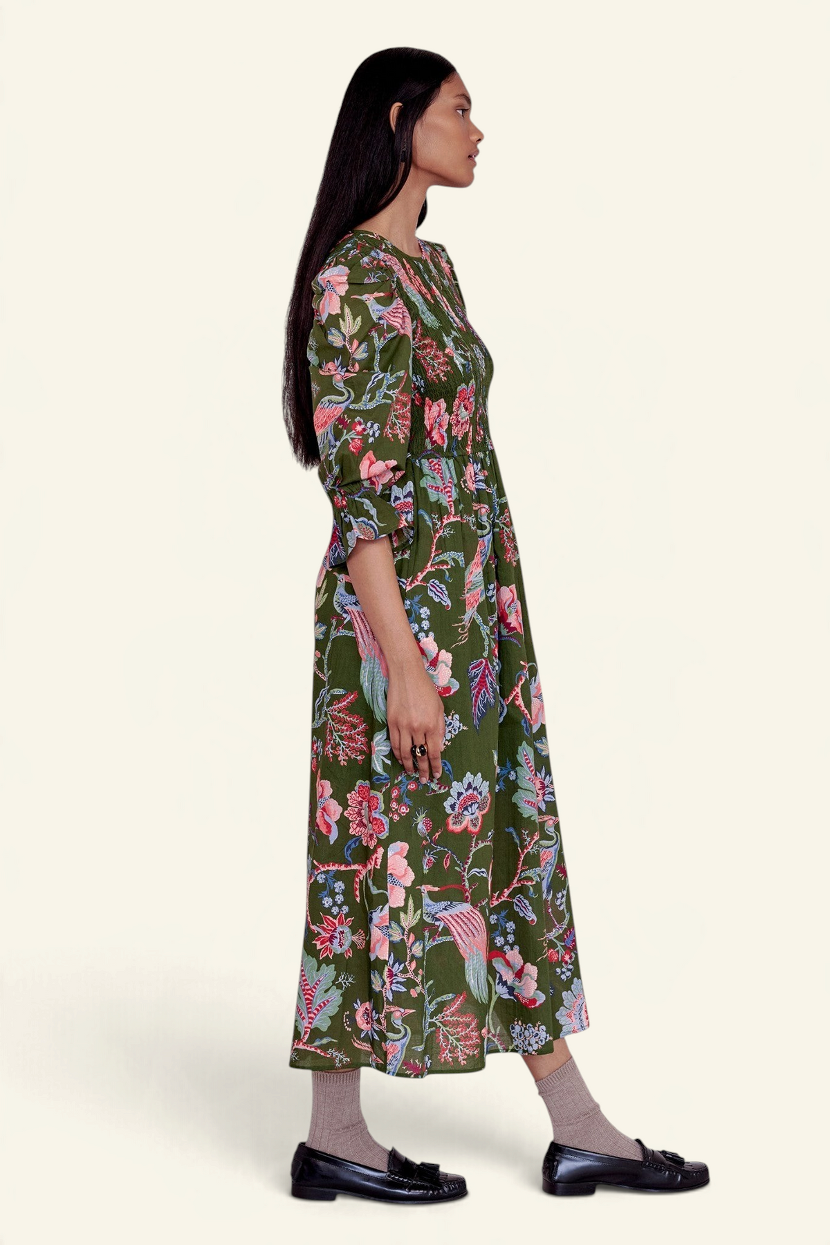 Banjanan Queenie dress in moss green chintz floral print with smocked bodice, puff sleeves, and side pockets
