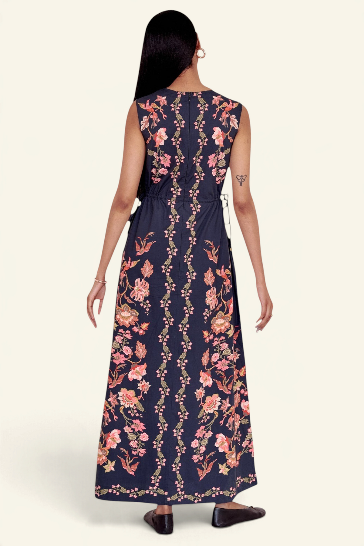 Banjanan Rhonda column dress in black with pink floral and bird print, featuring a sleeveless back view.