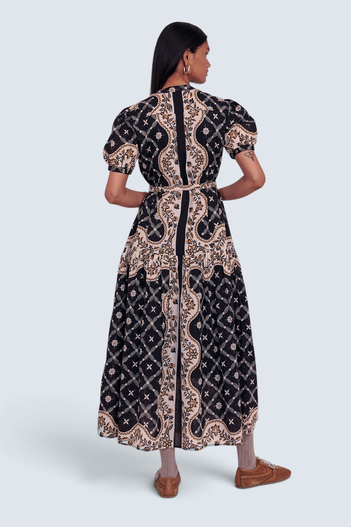 Banjanan Saylor full-length shirtdress in black with Victorian-inspired bandana print, tiered skirt, and belt.