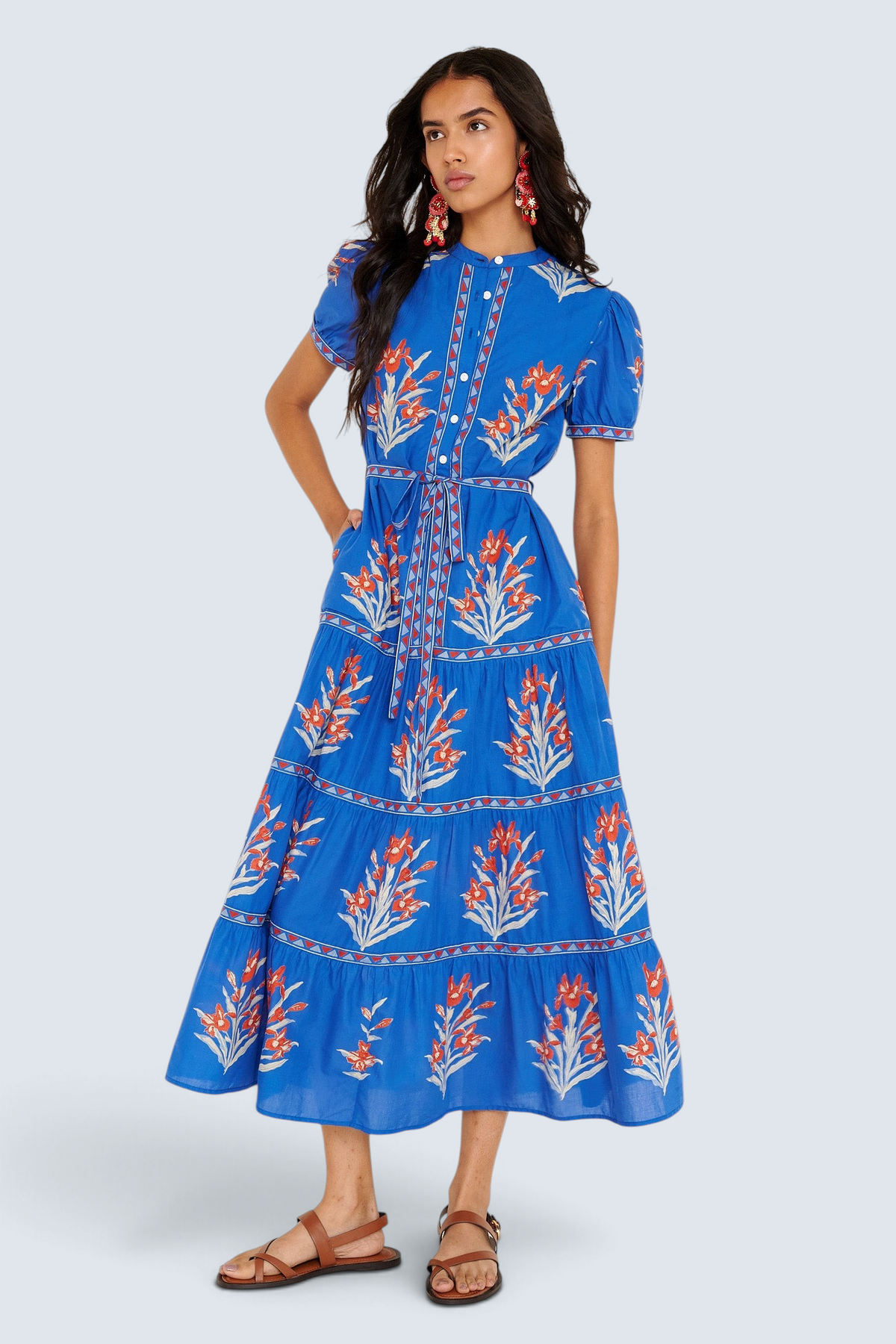 Banjanan Saylor dress in blue Brigitte nautical floral print with tiered skirt, puff sleeves, and detachable belt.