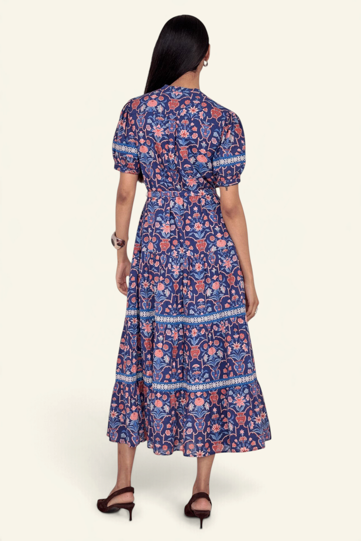 Banjanan Saylor floral print midi shirtdress in medieval blue with lace trim and tiered skirt, back view.
