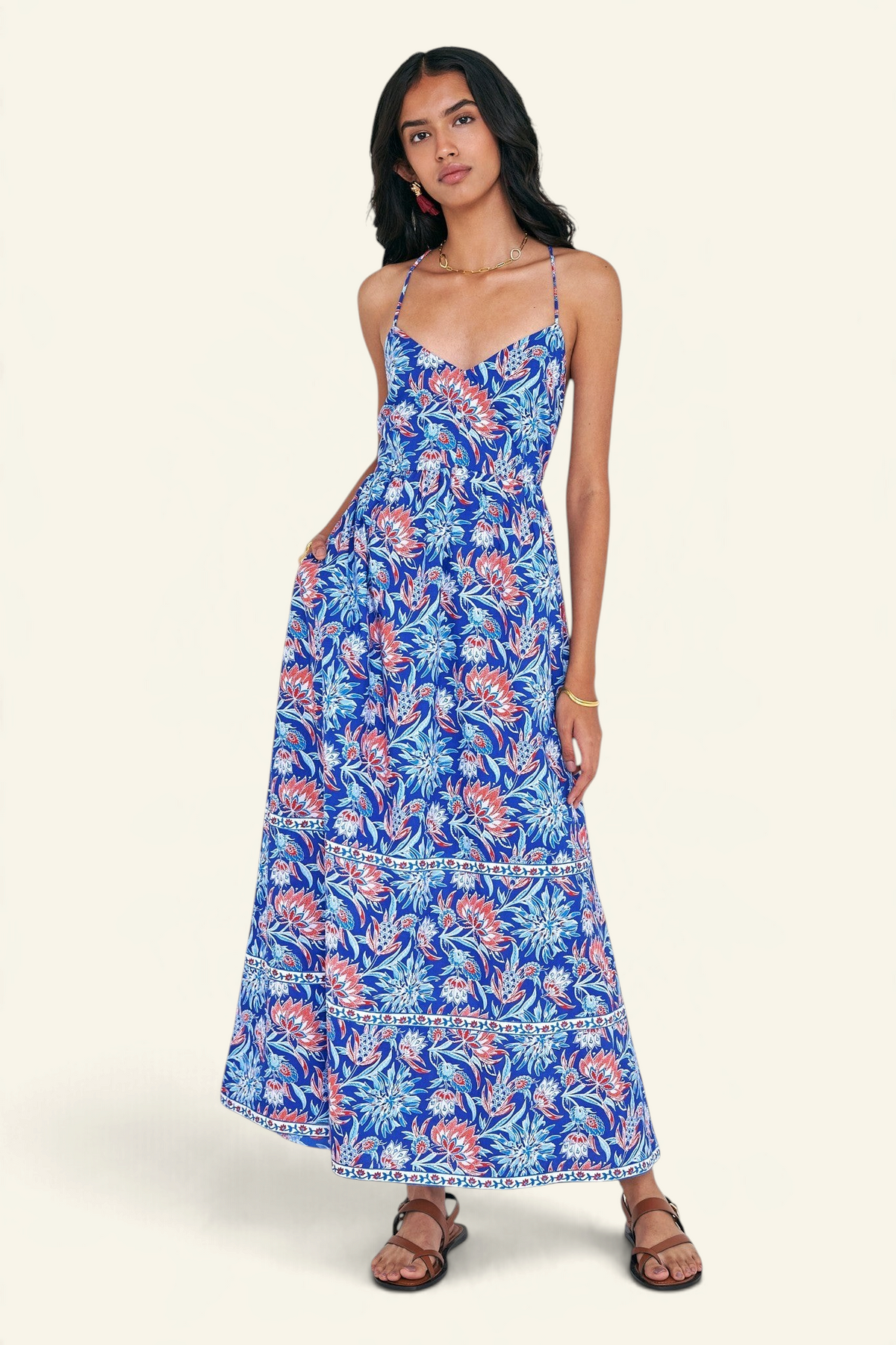 Banjanan Sofia sundress in blue and red Philippa floral print cotton voile with strappy back and ankle-length skirt.