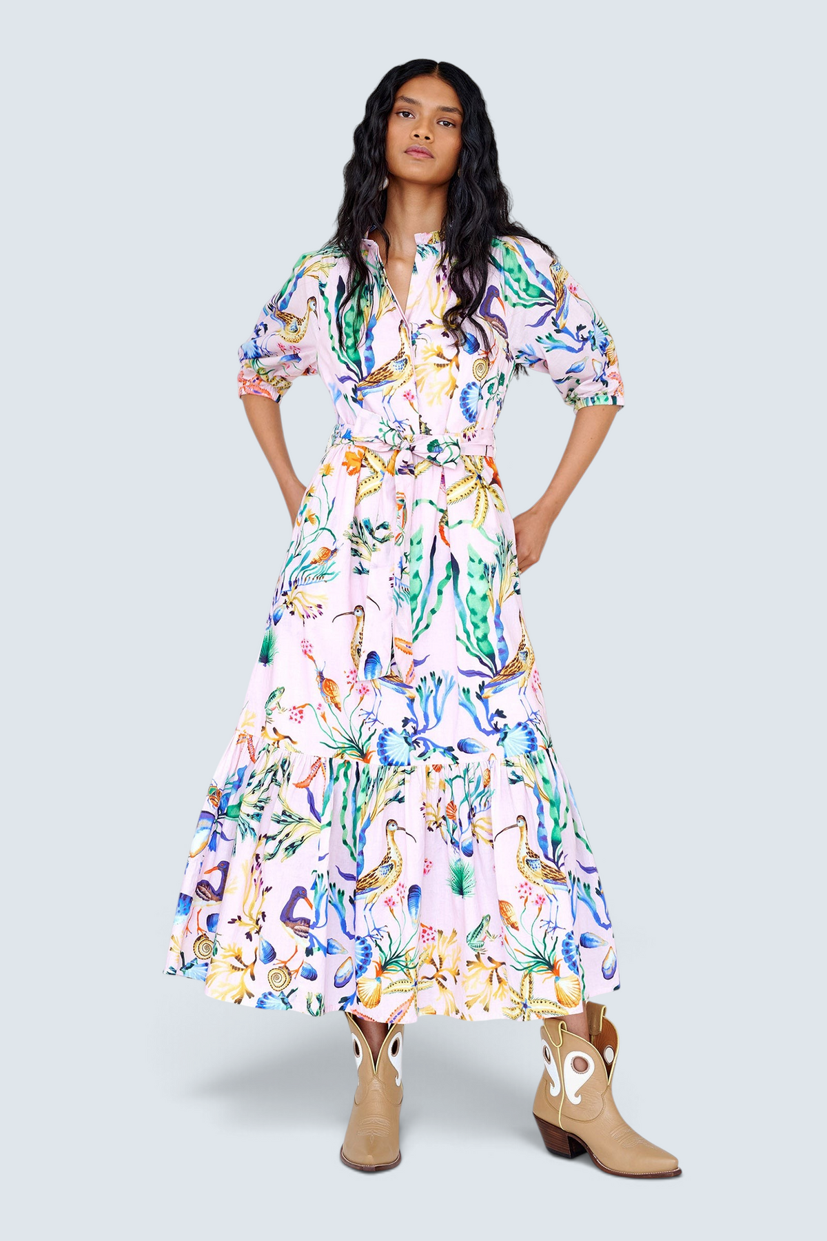 Banjanan Betty dress in pink cotton voile with Tidepool shell and sea life print, featuring a tie belt and pockets.