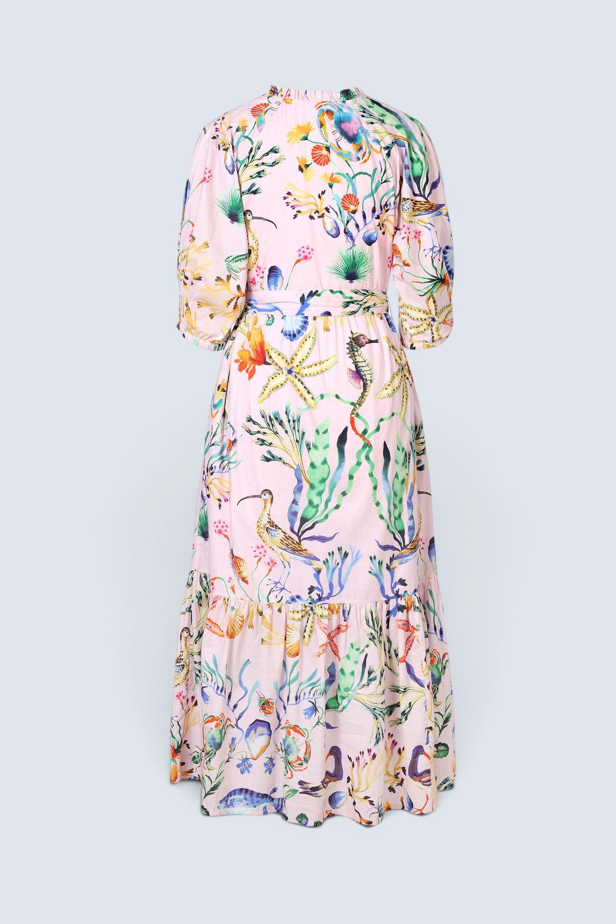Banjanan Betty dress in pink cotton voile with Tidepool sea life print, featuring raglan sleeves and a tie waist.