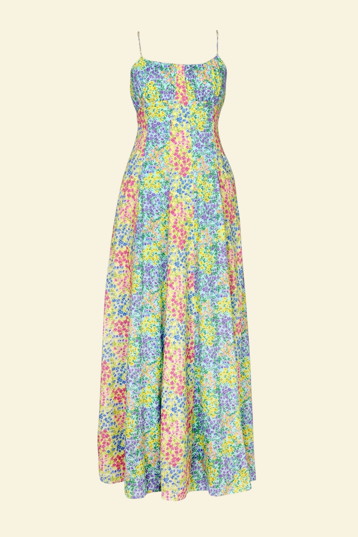 Banjanan Davina full-length gown in ditsy floral print with adjustable straps and paneled ankle-length skirt.