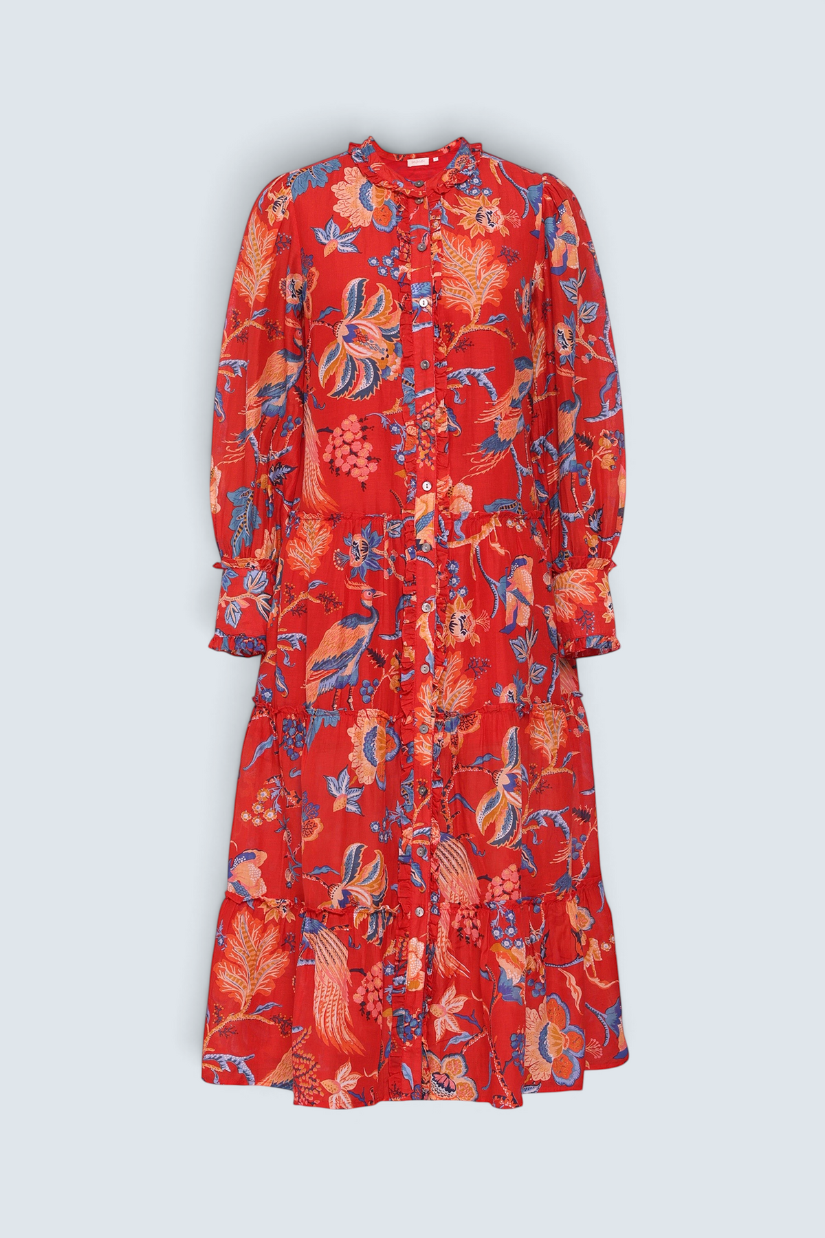 Front view of the Emira dress in Chintz print. It  features a flowing skirt, delicate ruffles, fabric-covered buttons, and a detachable belt.