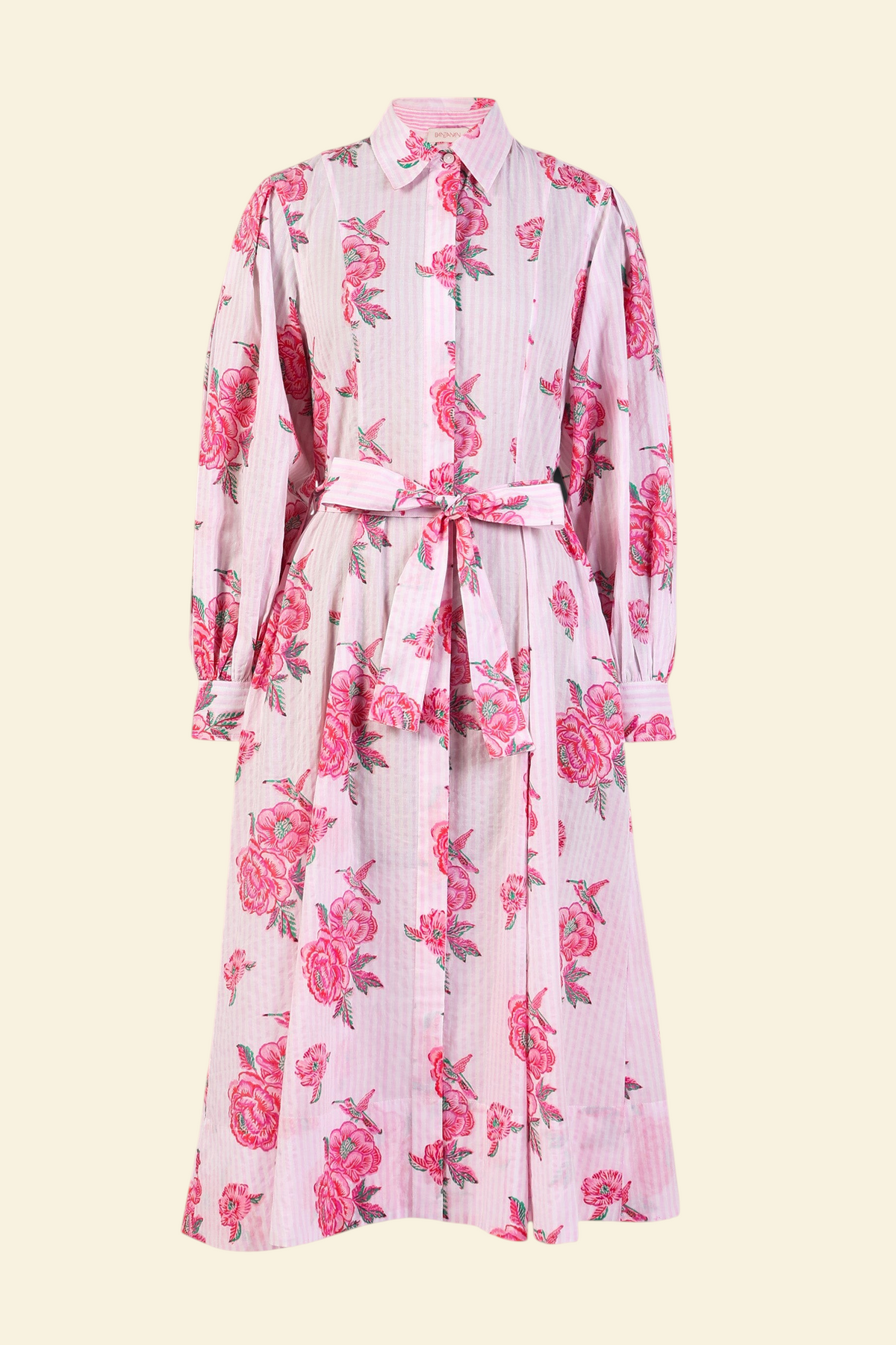 Front view of the Harris fitted shirtdress in striped cotton with rose and hummingbird block print, tie belt, and flared skirt with godets.