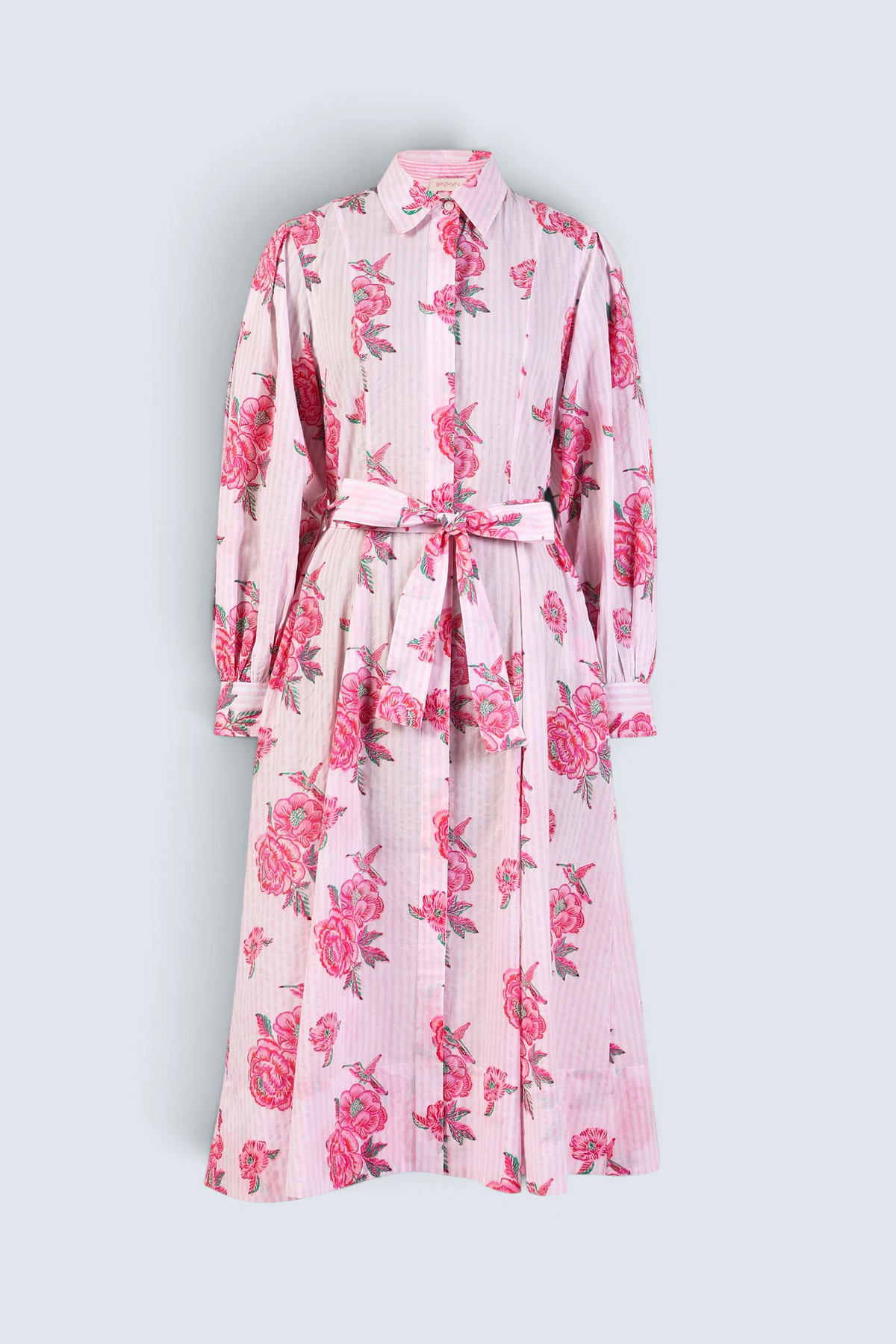 Front view of the Harris fitted shirtdress in striped cotton with rose and hummingbird block print, tie belt, and flared skirt with godets.