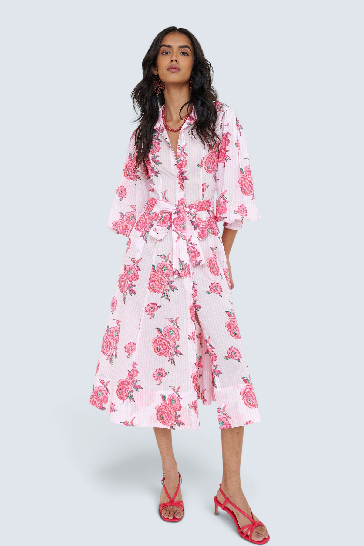 Banjanan Harris shirtdress in pink striped cotton with hand-printed rose and hummingbird pattern and tie waist belt.