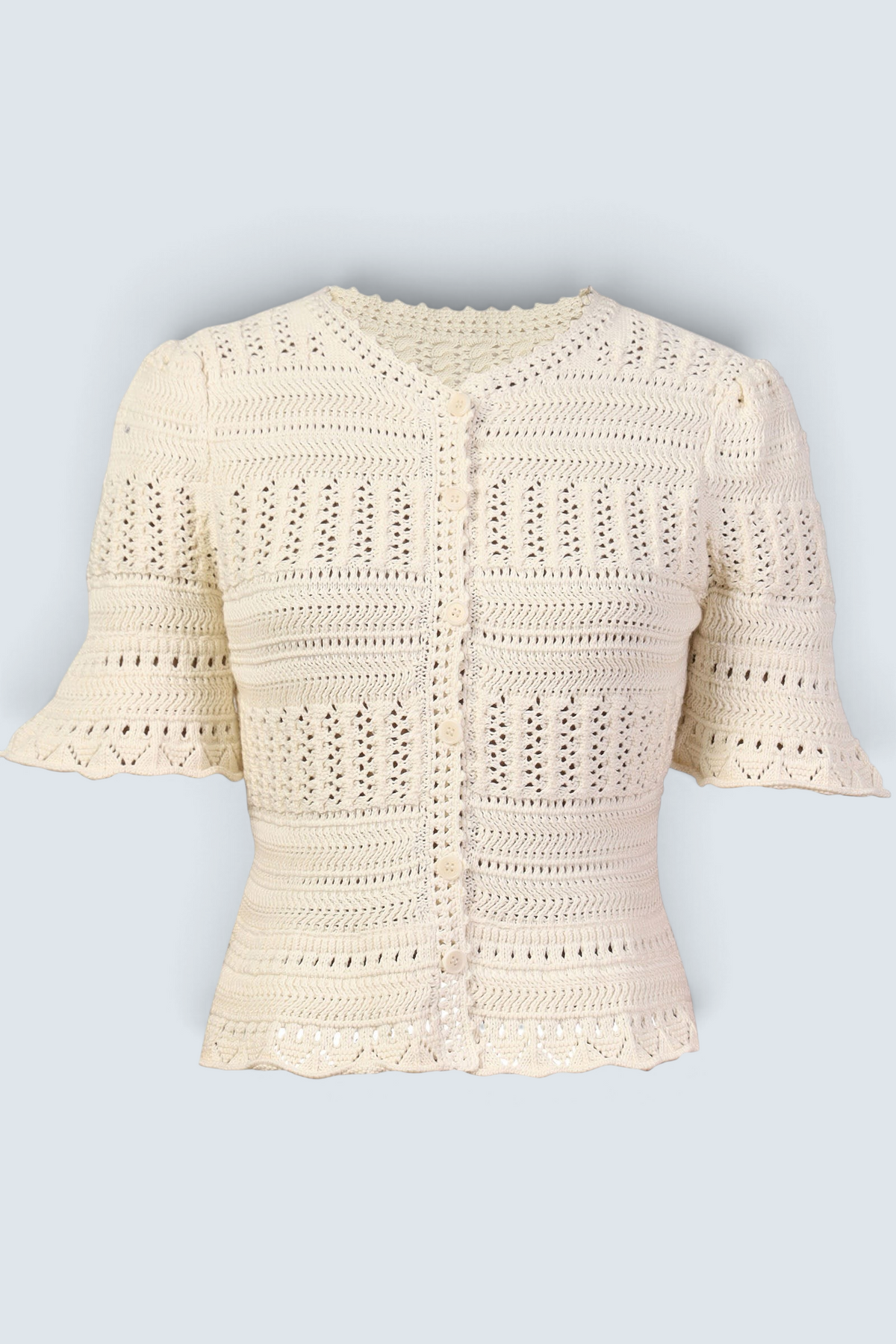Banjanan ivory short sleeve cardigan in 100% cotton with intricate hand-crocheted trim and front button placket.