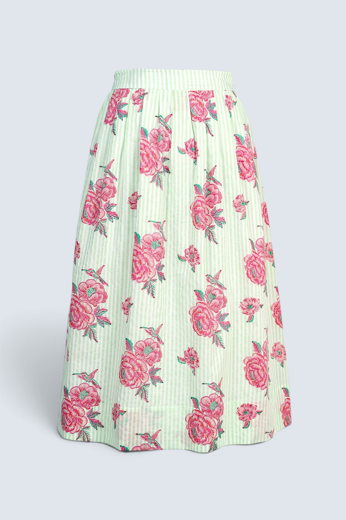 Front view the Magdalena skirt in the Eliza Rose print, featuring all-around pleats & hand block-printed floral motifs.