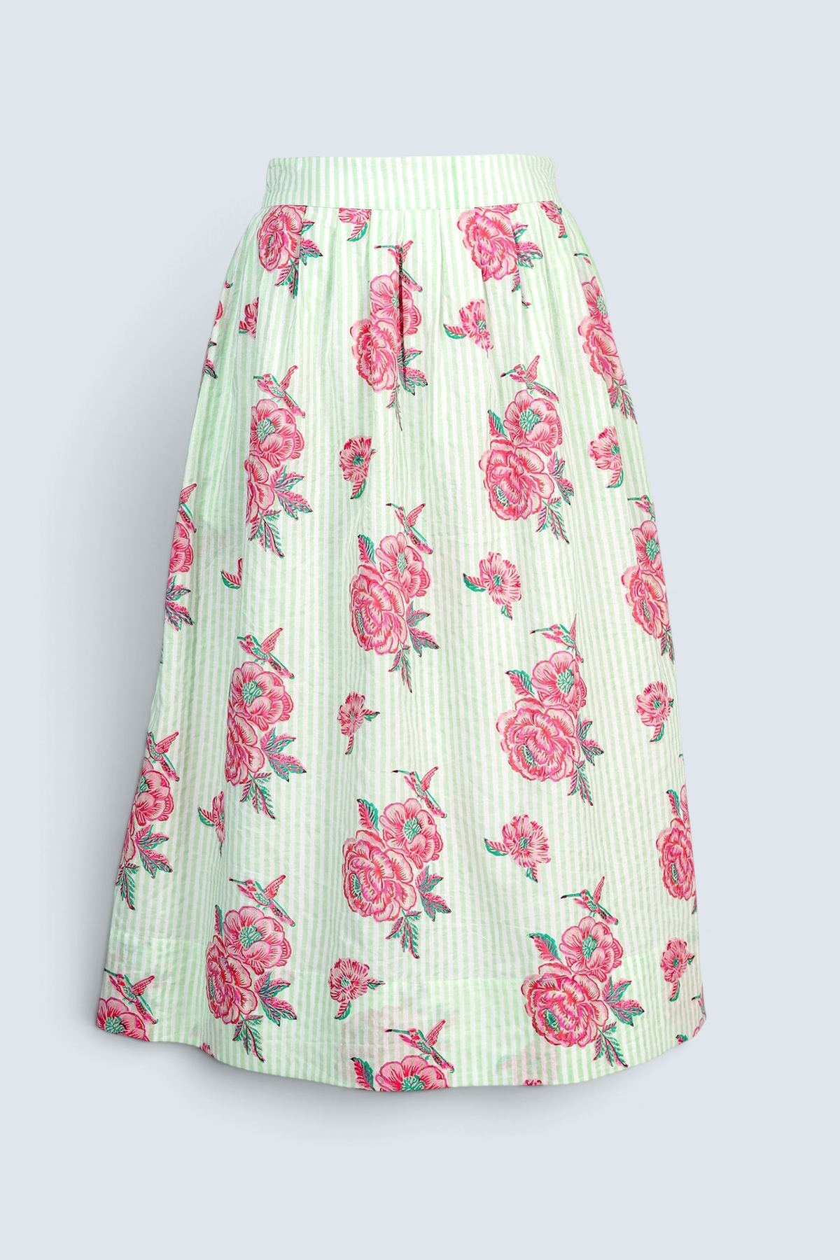 Back view the Magdalena skirt in the Eliza Rose print, featuring all-around pleats & hand block-printed floral motifs.