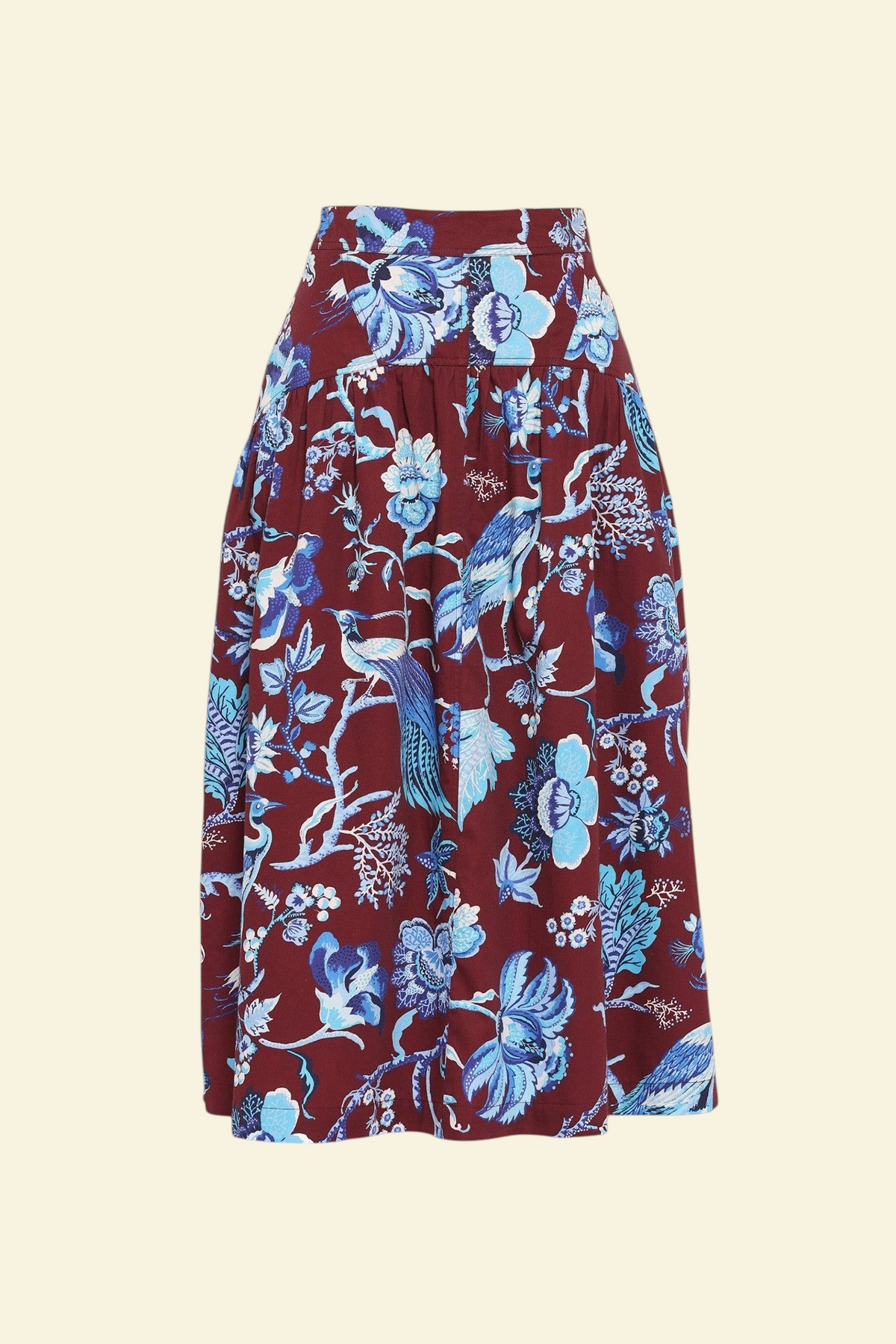 Banjanan Melodie skirt in cordovan cotton sateen with blue Victorian-inspired peacock and floral chintz print.